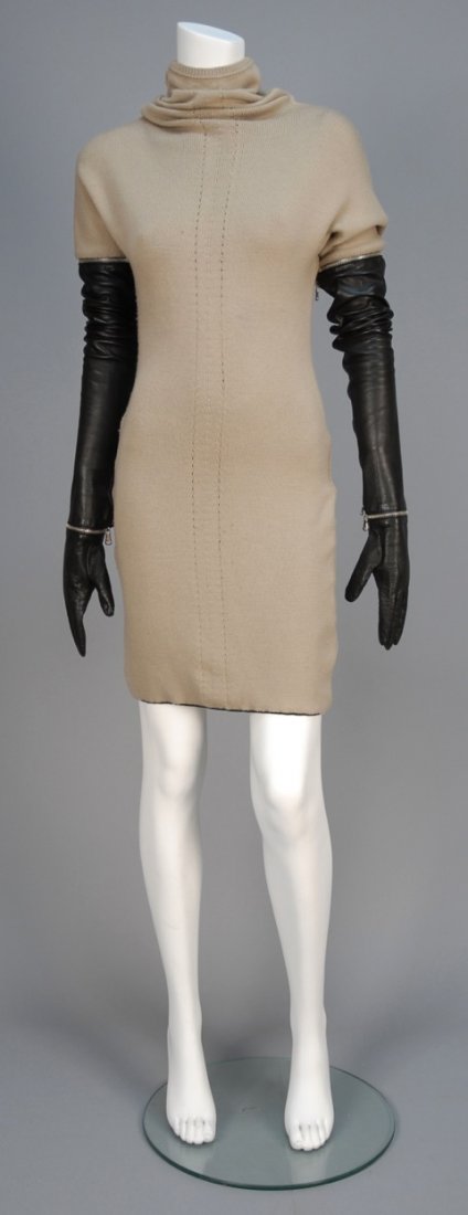 GIANFRANCO FERRE KNIT DRESS with ZIP-ON SLEEVES and: Taupe wool sheath with ruched high neck, long removable black leather sleeves with zip-on gloves, back zipper hidden in black trim band. Labeled. Marked size 44. (Few pulls, needs cleaning) good.