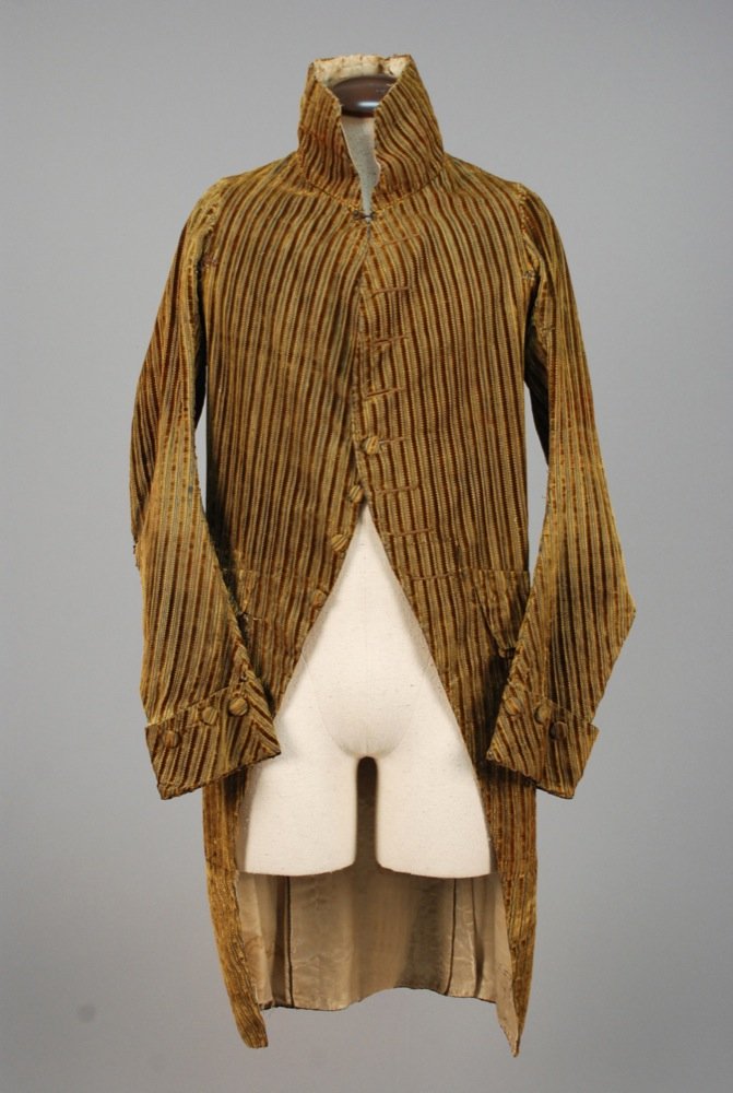 GENTS CORD du ROI COAT, 18th - EARLY 19th C. Olive silk: GENTS CORD du ROI COAT, 18th - EARLY 19th C. Olive silk velvet crenelated stripe cut to cream and blue stripe, high stand collar, wide cuff, slightly shaped pocket flap, vented back with narrow pleats