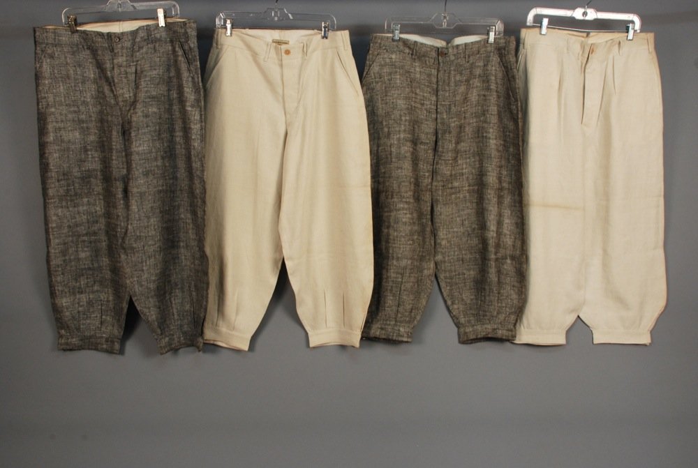FOUR PAIR MENS DEADSTOCK LINEN PLUS FOURS GOLF: FOUR PAIR MENS DEADSTOCK LINEN PLUS FOURS GOLF KNICKERS, 1930s. All having button fly, angled front pockets, buttoning back welt pockets, leg band with buckle. Two black and white tweed, inside tag "T