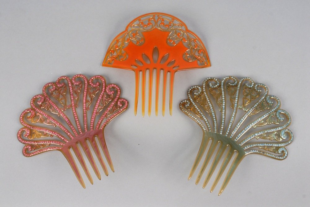 THREE LARGE PIERCED CELLULOID HAIR COMBS, EARLY 20th C. (1 of 2)