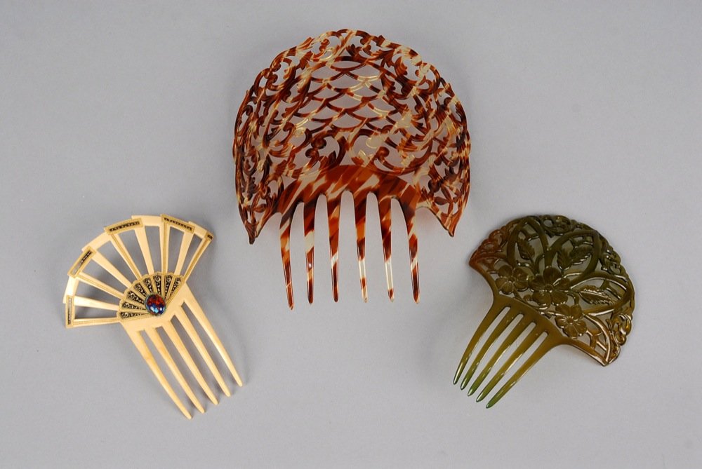 THREE PIERCED CELLULOID HAIR COMBS, EARLY 20th C. One (1 of 2)