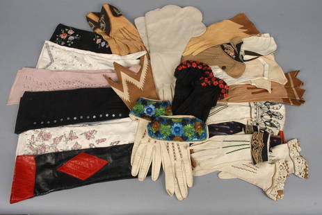 LOT of INTERESTING LADIES GLOVES, MID 20th C. Mostly: LOT of INTERESTING LADIES GLOVES, MID 20th C. Mostly French, in suede or leather, including embroidered, appliqued, beaded and pierced, one pair Lilly Dache cotton gauntlets with scalloped trim. Twent