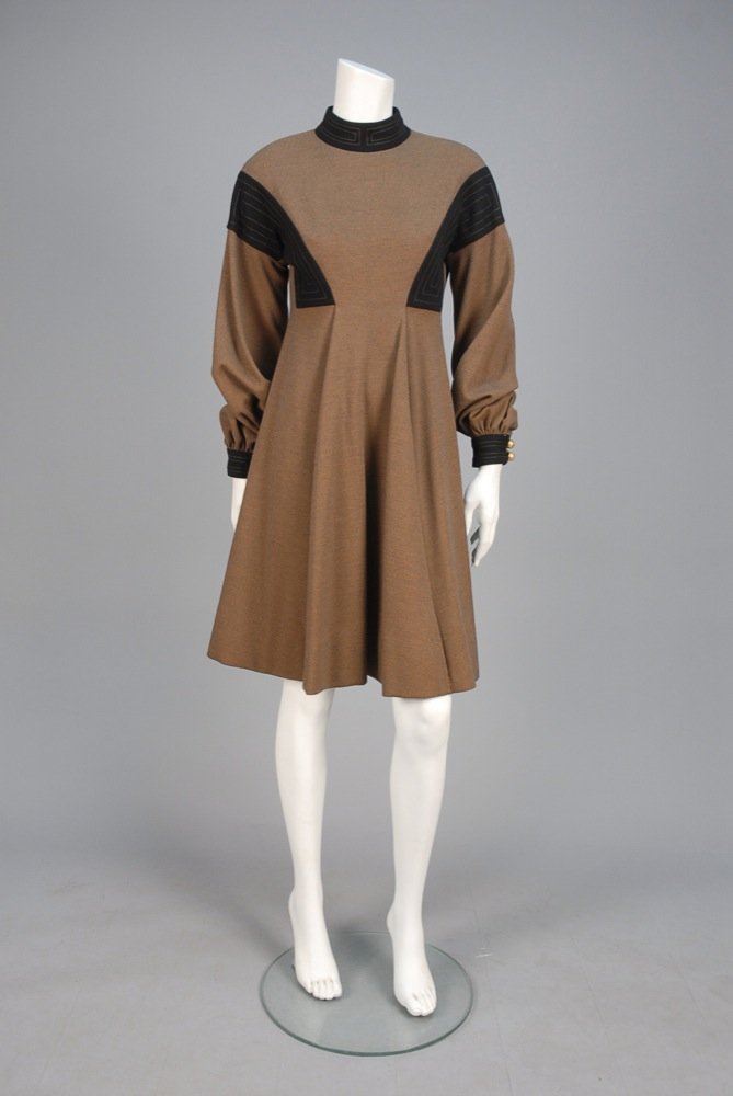 RONALD AMEY 2-TONE WOOL DAY DRESS, 1970s. Brown with: RONALD AMEY 2-TONE WOOL DAY DRESS, 1970s. Brown with long balloon sleeve having black stand collar, shoulder detail and cuff with top stitching, gold tone cuff buttons, full skirt with front and back