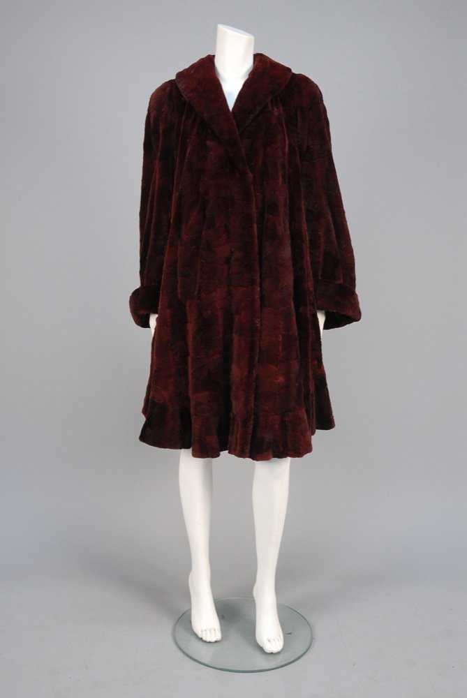 MAXIMILIAN DYED FUR SWING COAT with FLOUNCED HEM. (1 of 4)