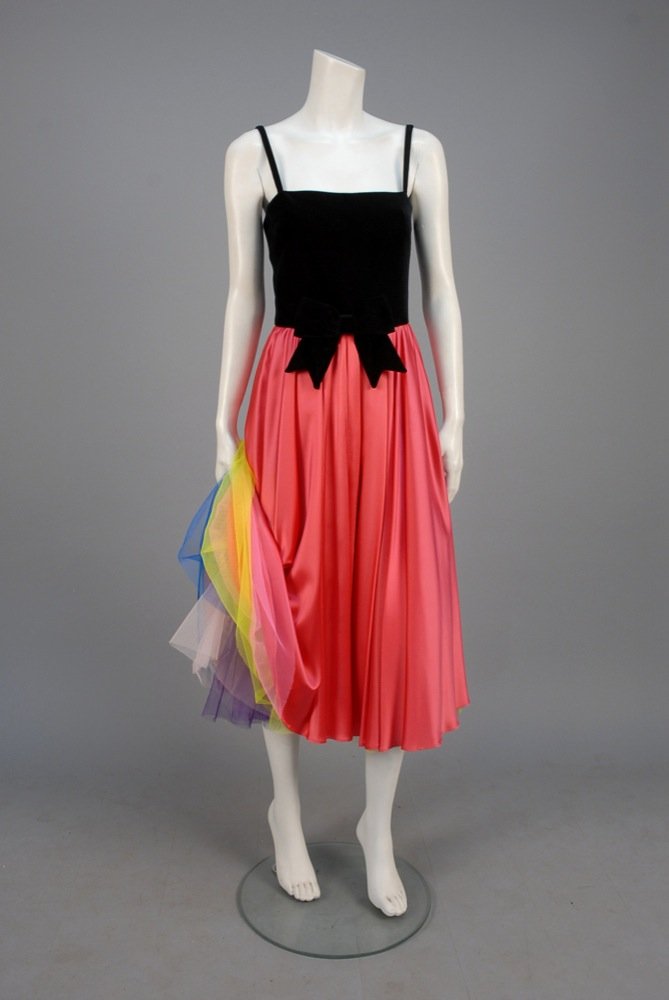 MOSCHINO VELVET and SATIN DRESS with RAINBOW CRINOLINE.: MOSCHINO VELVET and SATIN DRESS with RAINBOW CRINOLINE. Rayon/acetate with black bodice having narrow strap and self bow at waist, hot pink satin skirt with layered tulle underskirt of ten layers in v