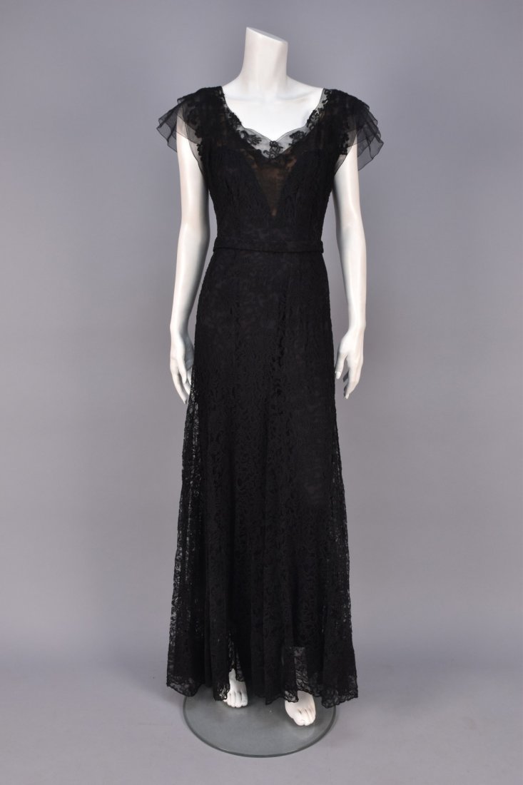 BLACK LACE EVENING GOWN, 1930s. (1 of 2)