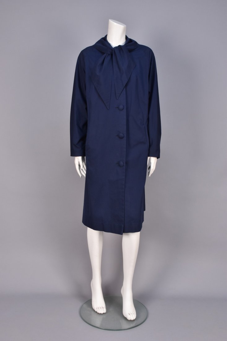 SCHIAPARELLI PARIS RAINCOAT, 1950s. (1 of 3)