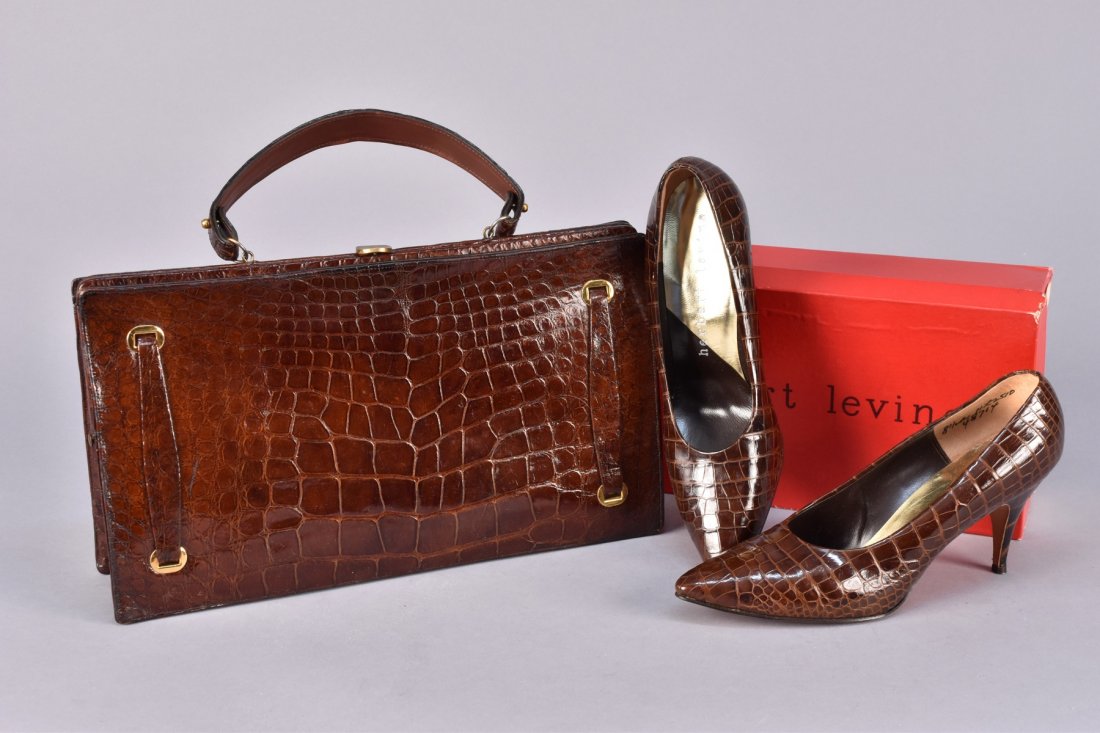 HERBERT LEVINE ALLIGATOR HIGH HEELS with WILCOF: Brown hide pumps with pointed toe and 3 1/4-inch heel, Size 8 1/2 A. Shoes in new, unworn condition, box good. Wilcof Original rectangular handbag having brass hardware and hinged frame, single handle