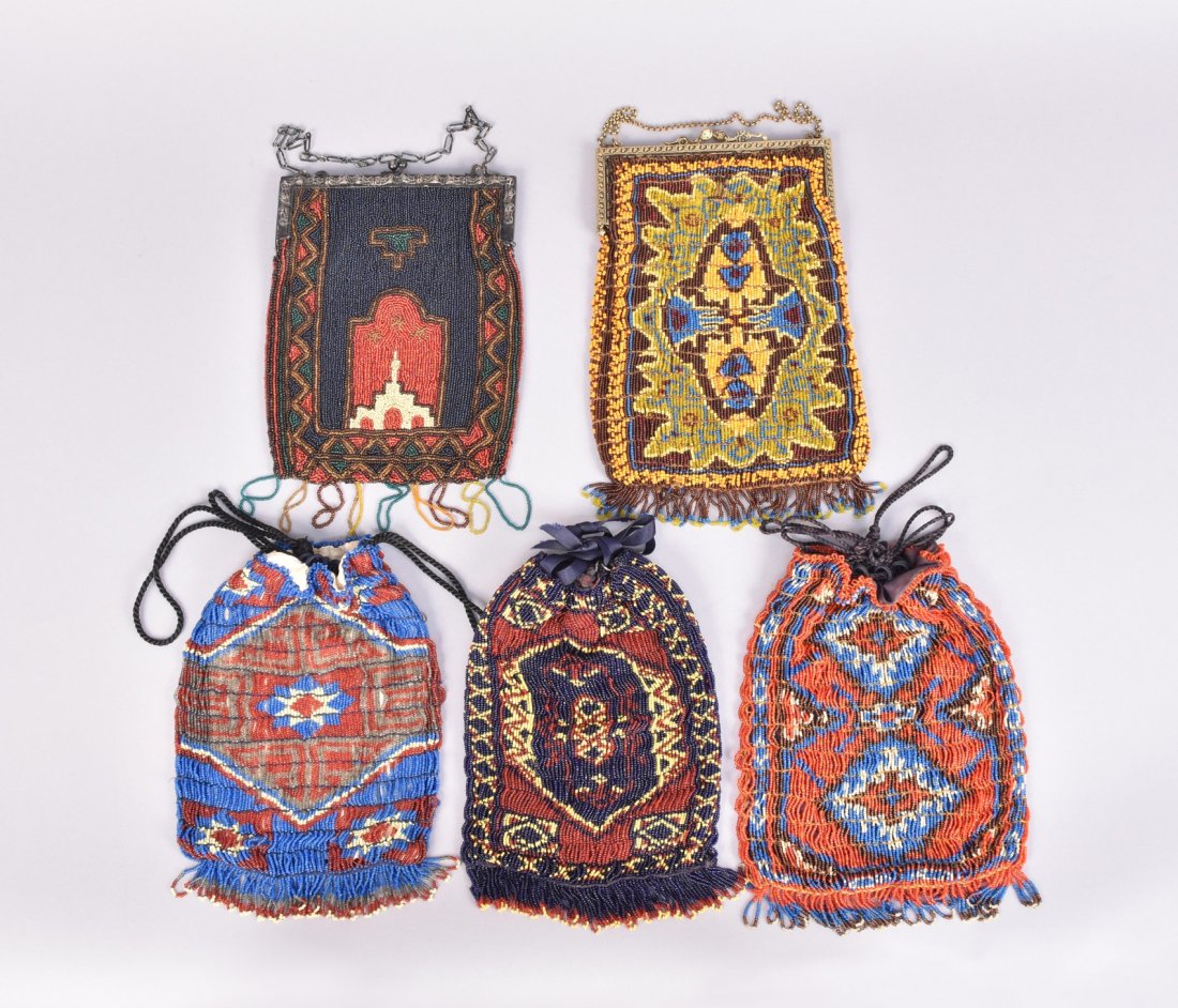 FIVE COLORFUL CARPET DESIGN BEADED BAGS, EARLY 20th C. (1 of 3)