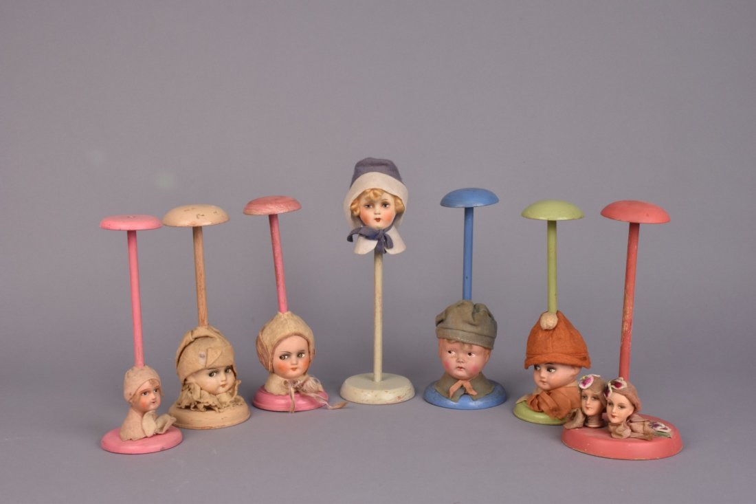 SEVEN GERMAN COMPOSITION HAT STANDS, c. 1930 (1 of 1)