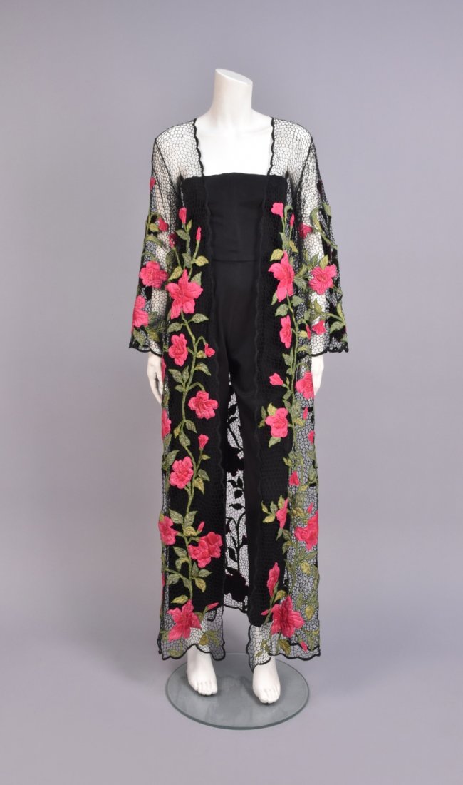 LANVIN PARIS STRAPLESS SILK JUMPSUIT, 1960s.: Black bengaline having semi-boned straight cut bodice, pleated trousers with angled pockets tapering slightly toward the ankle, labeled. B-32, W-22, inseam 29, L-46, excellent. Together with a black n