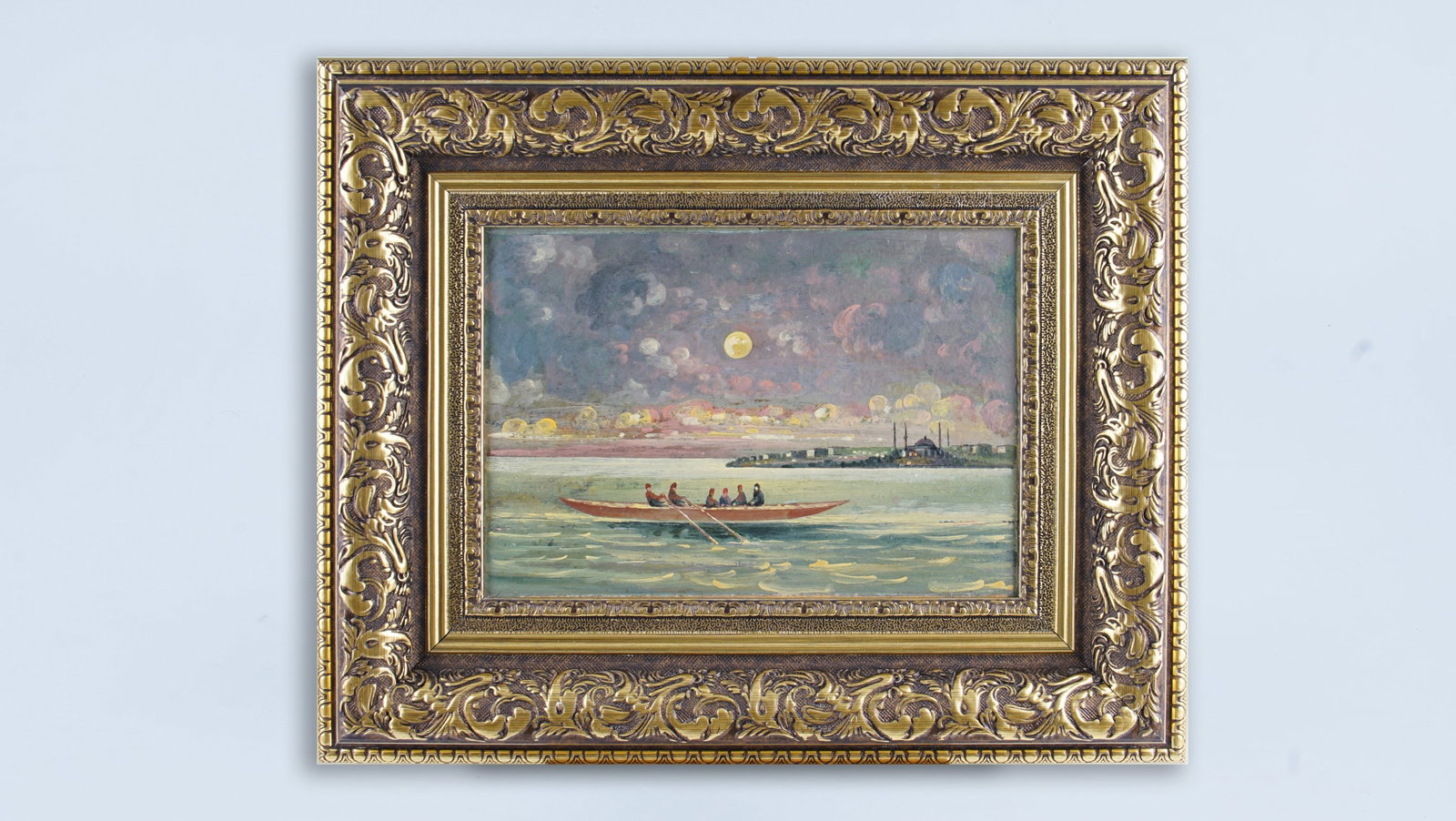 MOONLIT BOSPHORUS SCENE WITH BOAT & FIGURES, EARLY 20TH C.: ,An evocative early 20th-century oil painting depicting a moonlit Istanbul seascape, animated by a long rowing boat carrying figures across gently shimmering waters. Executed in oil on panel, the comp