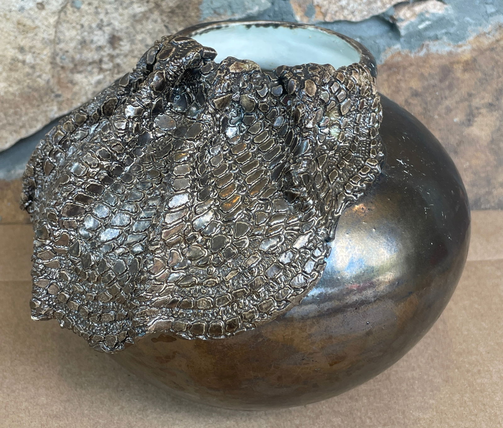 Raku Pottery 6" Vase Metallic Glaze Scale Texture Signed "Jonas" Unknown Artist: 6" height / 7" length. Signed "Jonas" with a small drawing of a whale. Unknown Artist.