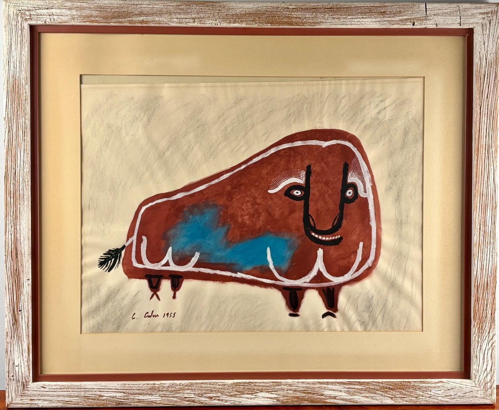 Charles Culver 1955 ‘Buffalo’ Mixed Media on Paper: Media artwork of a buffalo by Charles Culver, signed and dated 1955. Presented on paper in a textured whitewashed wooden frame with a red inner border and beige matting. The piece features bold contou