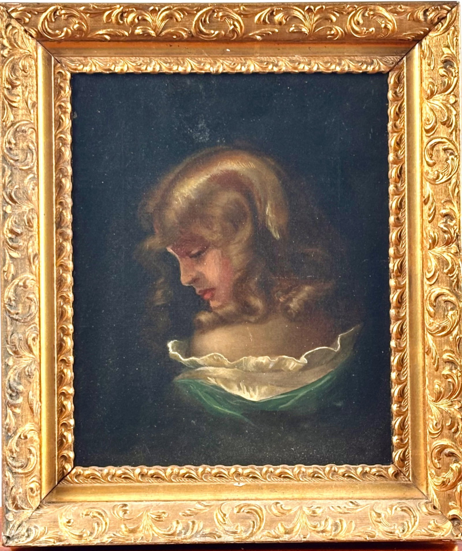 Continental School Oil on Canvas, ‘Portrait of a Young Girl’, Gilt Frame: Oil painting on canvas attributed to the Continental School, depicting a young girl in profile with light hair and ruffled attire. Presented in an ornate gilt wooden frame with scrollwork detail. The