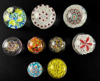 Nine Murano and KB Glass Paperweights, Including Millefiori and Floral Designs