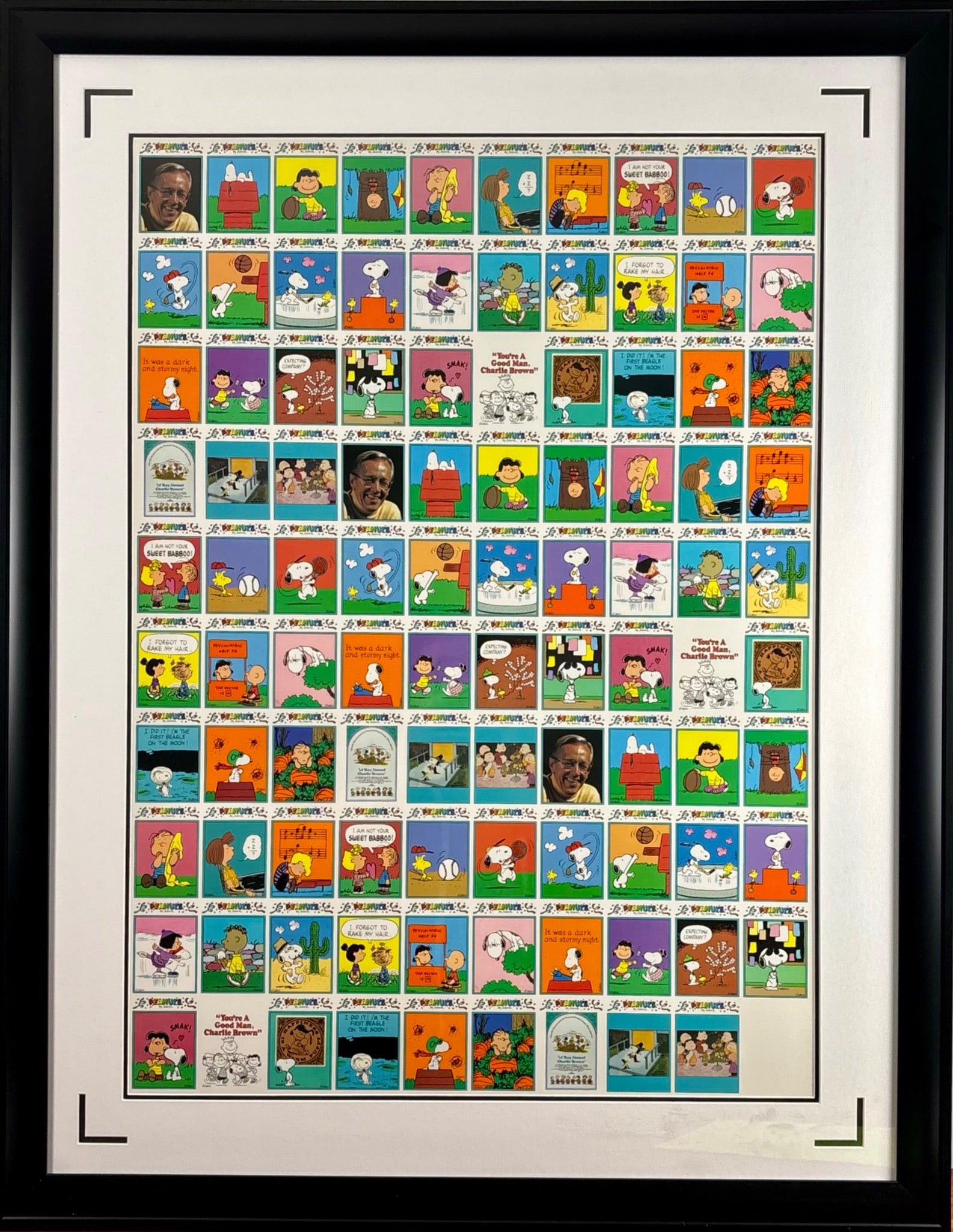 1991 Peanuts Uncut Trading Card Lithograph Sheet: Framed lithograph featuring an uncut sheet of Peanuts trading cards designed by Charles Schulz. Printed on wove paper in 1991, the sheet includes multiple colorful illustrations of iconic Peanuts char