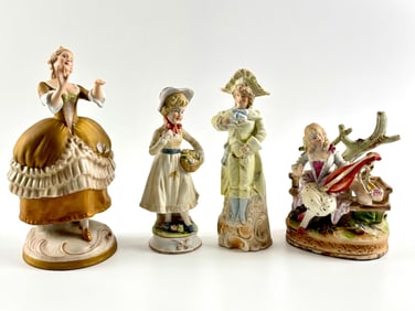 Four Hand Painted Porcelain Figurines with Royal Dux and Markings