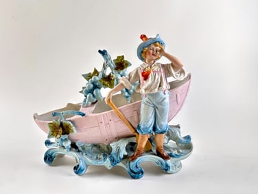 German Bisque Figural Centerpiece with Boy and Boat Motif