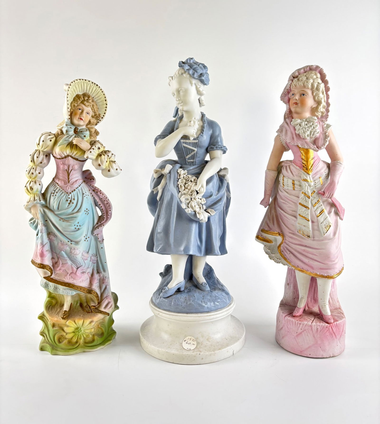 Three Bisque Porcelain Figurines Depicting Women (1 of 15)