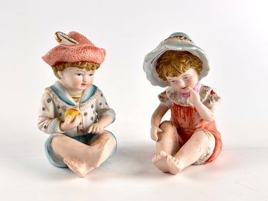 Andrea by Sadek Porcelain Figurines of Seated Children