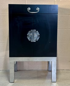Black Lacquered Cabinet with Polished Metal Hardware and Base