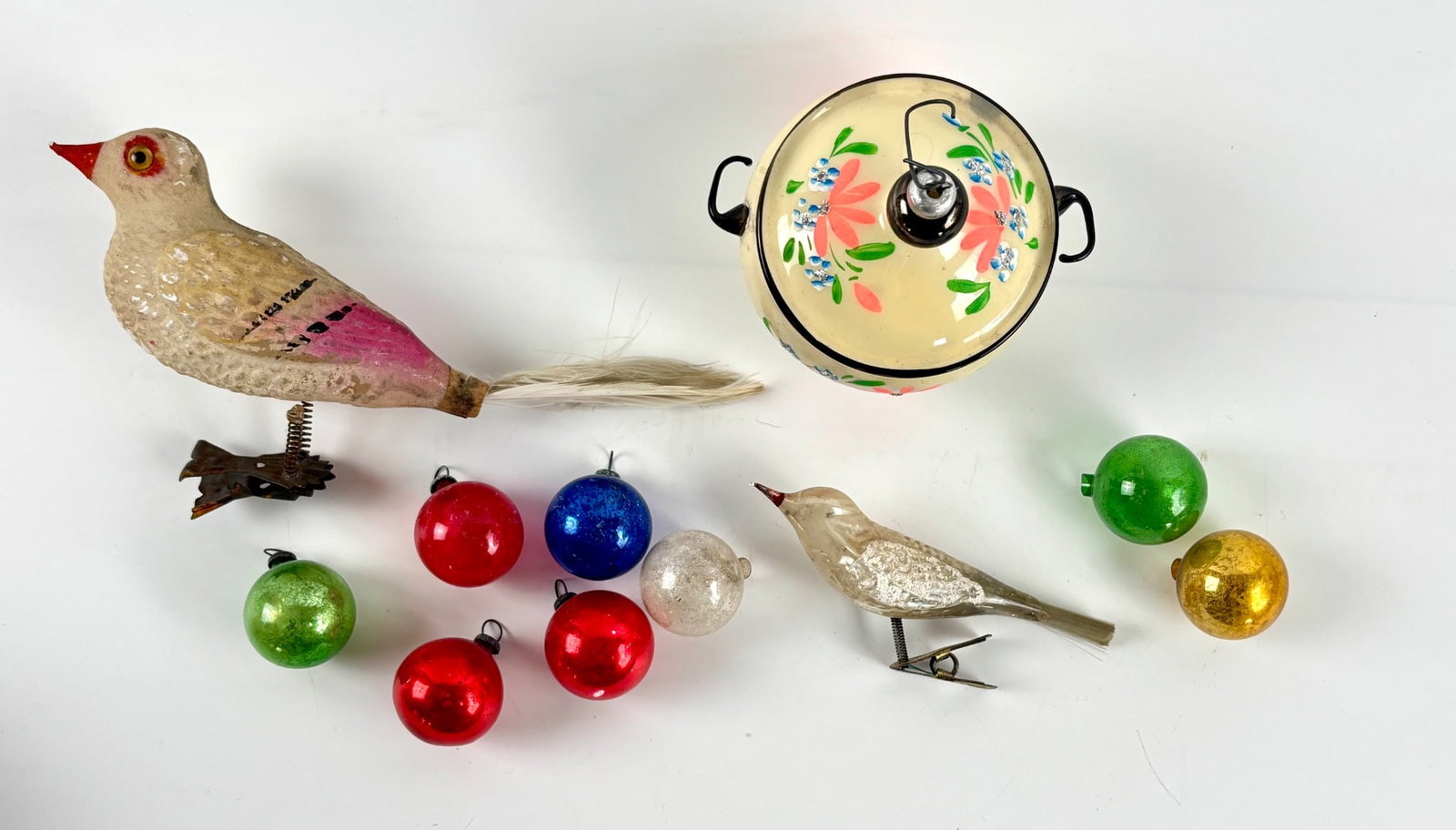 Vintage Hand Painted Glass Christmas Ornaments and Clips: Vintage Christmas ornaments, including a hand-painted bird shaped clip ornament with glitter details, a textured clip bird ornament with feathered tail, a hand painted glass lidded pot shaped ornament