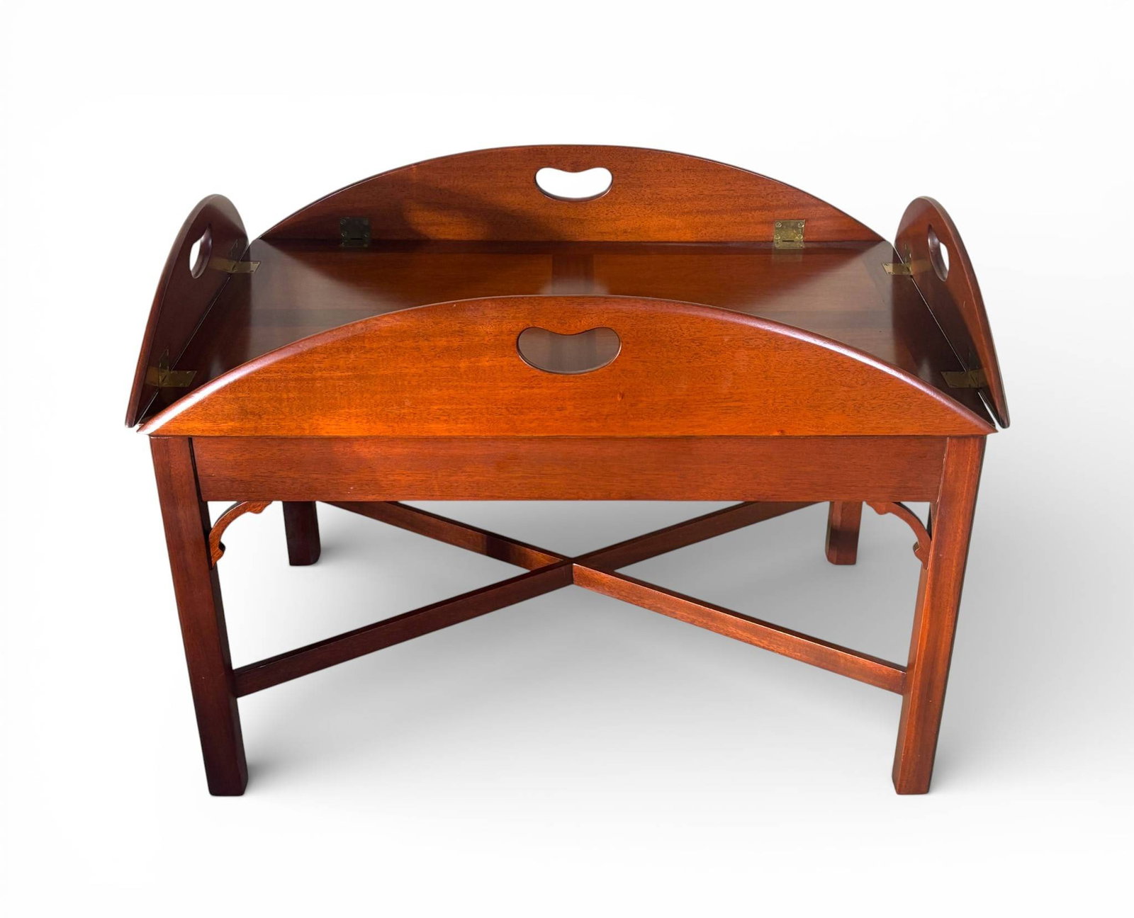 Kittinger Williamsburg Two Piece Mahogany Butlers Tray Table T363: Mahogany two-piece butler’s tray table by Kittinger, part of the Williamsburg Reserve collection. Features a removable tray with hinged folding sides and integrated handles, fitting snugly on the ba