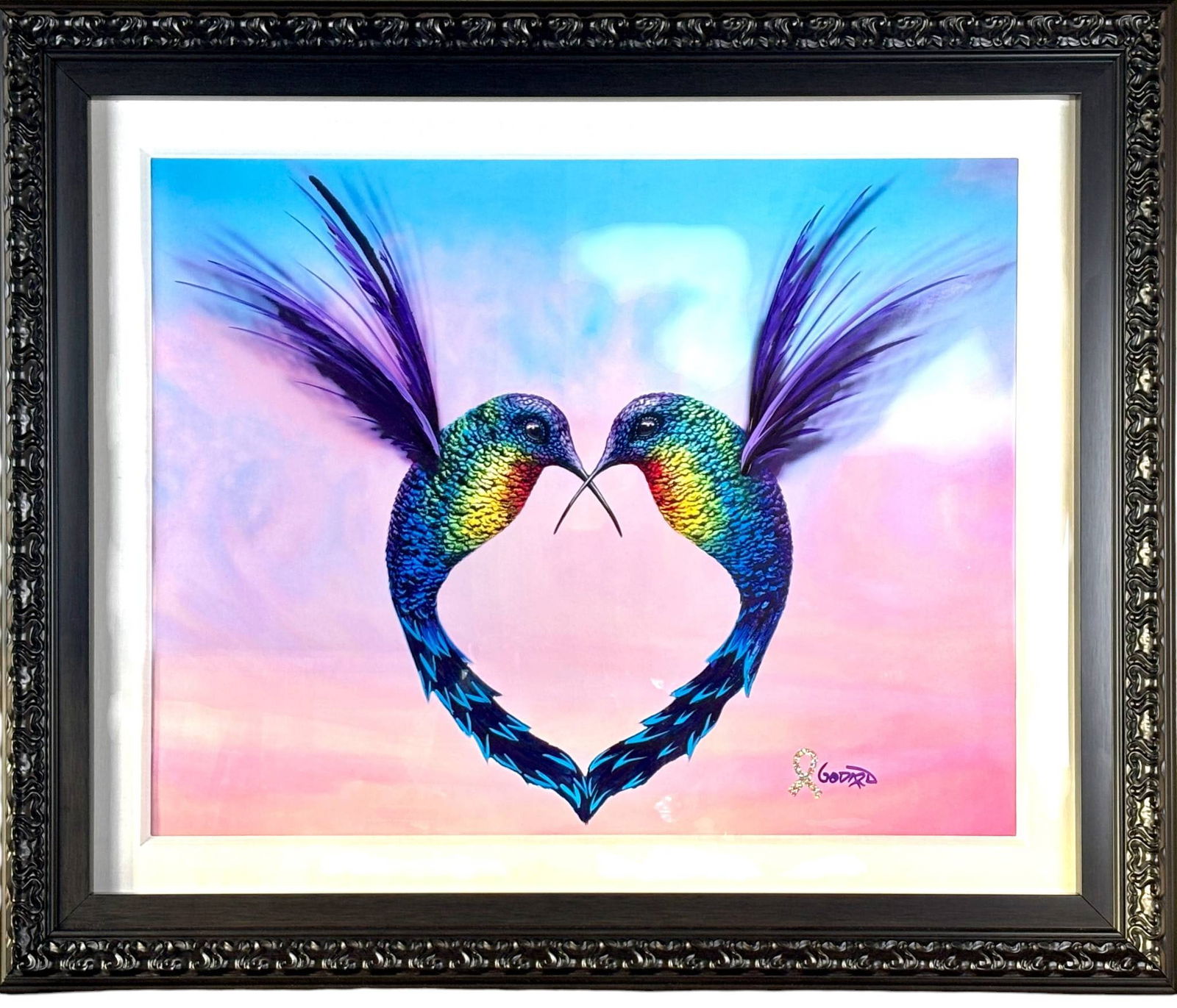 Michael Godard Wings of Hope Mixed Media on Metallic Paper. 2023: Artwork by Michael Godard titled Wings of Hope created in 2023. Features two vibrantly colored hummingbirds forming a heart shape with their bodies against a pastel toned background. Constructed on me