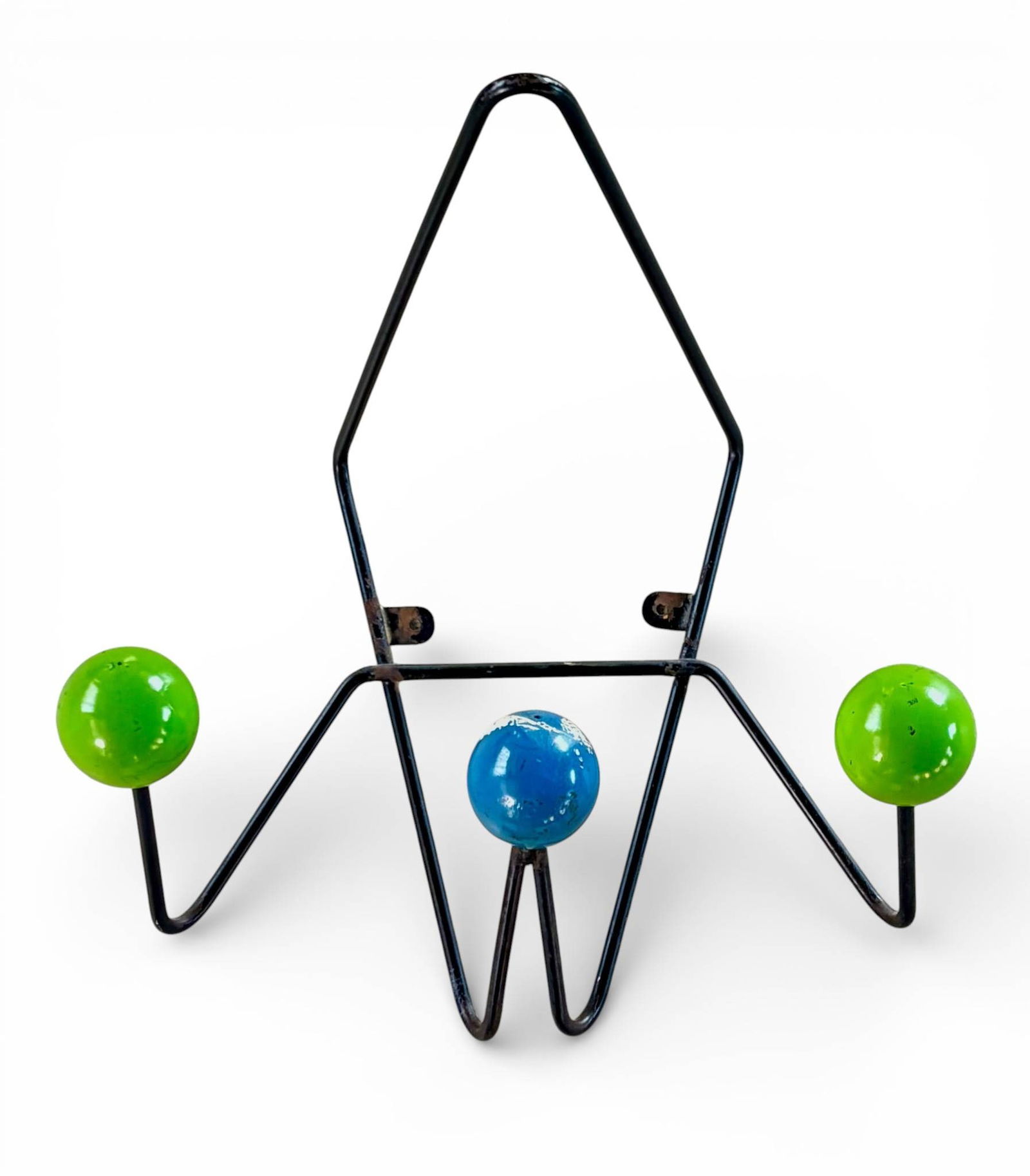 MCM Atomic Coat Rack Roger Feraud: Mid-century modern MCM atomic style coat rack attributed to the design of Roger Feraud. Features a black metal wire frame with three spherical hooks in green and blue. Mounting brackets are visible on