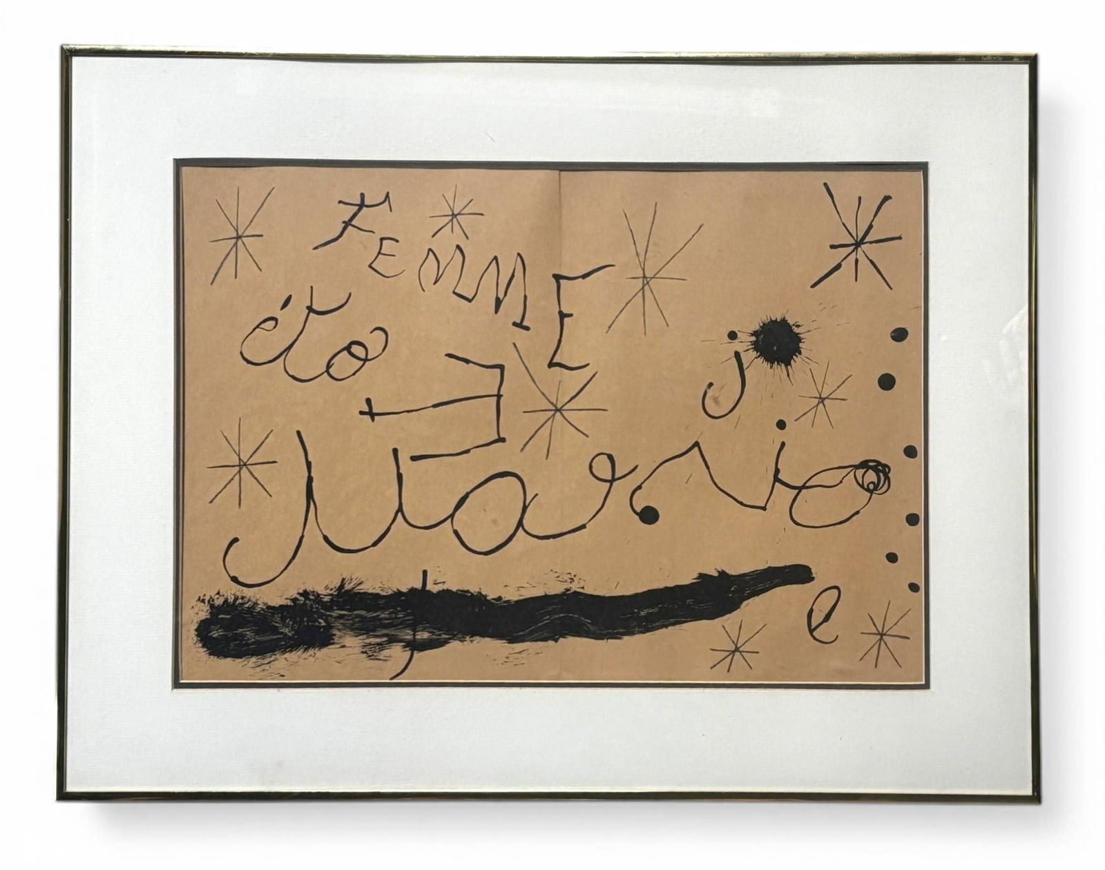 Joan Miro Original Lithograph with COA: An untitled lithograph by Joan Miro, a renowned 20th century Spanish artist, featuring abstract text and star like motifs in black ink on brown paper. The artwork is professionally matted and framed