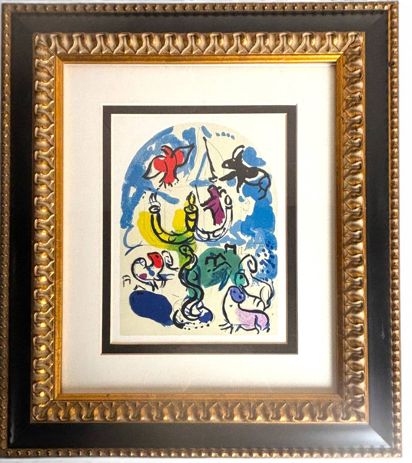 Marc Chagall Lithograph Dan II on Wove Paper: Marc Chagall lithograph titled Dan II printed on wove paper. Executed by the respected atelier Mourlot Freres, Paris. Accompanied by a Certificate of Authenticity. Framed in a gilt and black detailed