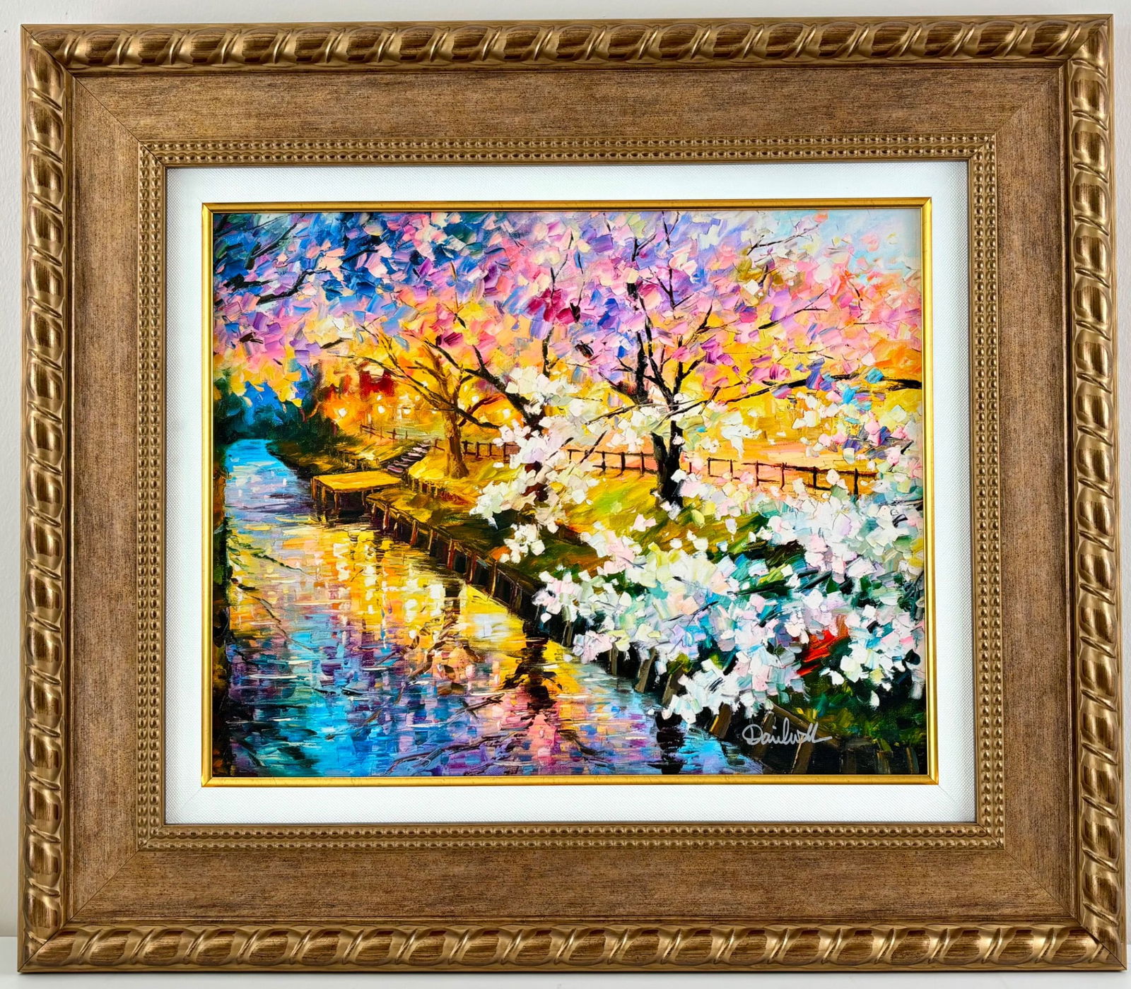 Wall Daniel Limited Edition Cherry Blossom Embellished Giclee on Canvas: Limited edition giclee on canvas titled Cherry Blossom by artist Wall Daniel. Depicts a vibrant, impressionistic landscape with cherry blossoms and a reflective canal scene. Signed by the artist on th