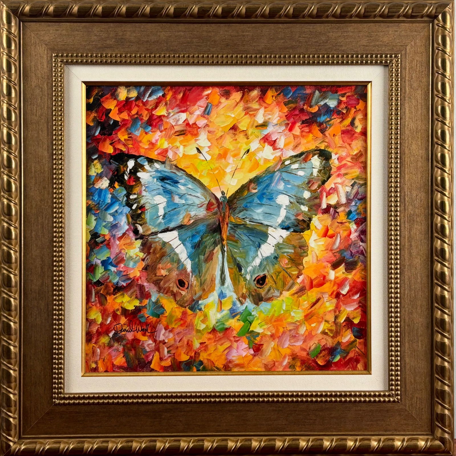 Daniel Wall Produce Giclee on Canvas with COA: Daniel Wall Produce, created in 2022, is a giclee print with hand embellishments on canvas. Featuring a vibrant butterfly set against a colorful impressionistic background, this piece is framed in a g