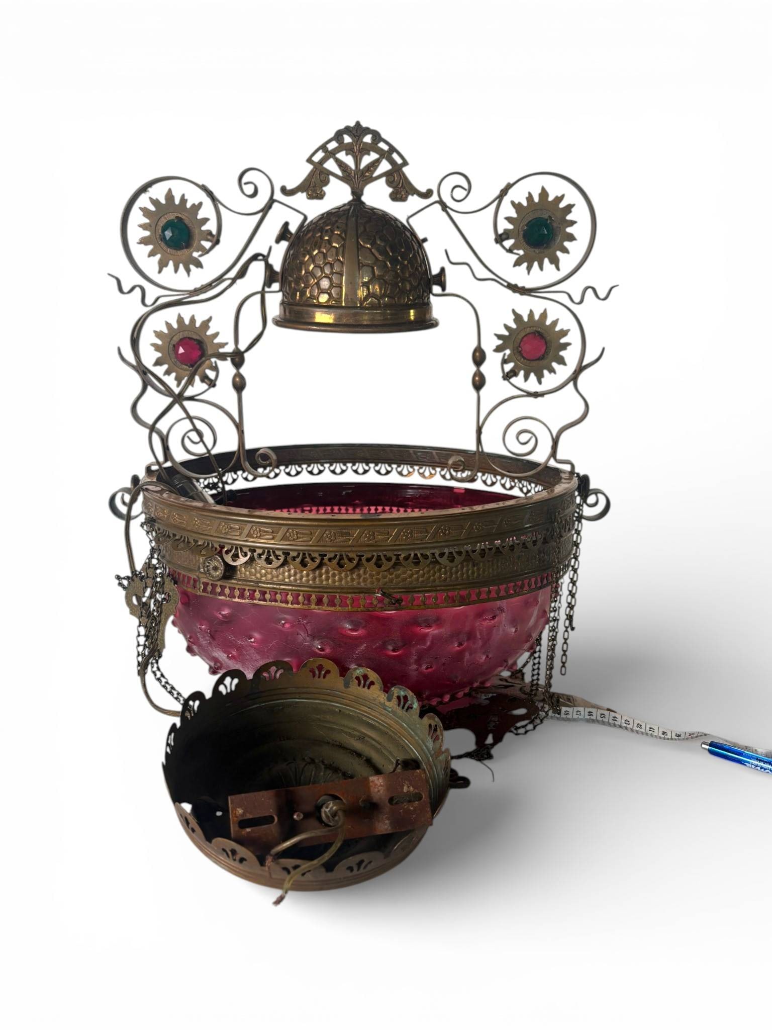 Victorian Cranberry Hobnail Glass Fixture: Victorian style ceiling light fixture featuring a cranberry hued hobnail glass bowl with brass filigree detailing. The glass shade is embellished with raised hobnail designs, and the brass frame inclu