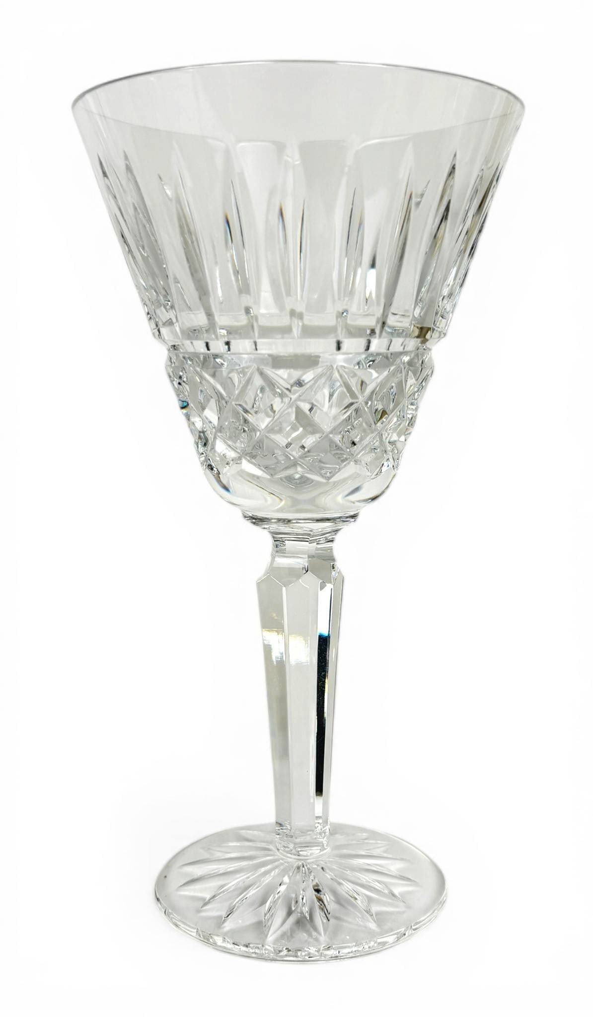 10 Waterford Crystal Maeve Pattern Wine Glasses: 10 Waterford crystal wine glasses in the Maeve pattern. Featuring a cut pattern with vertical panels and a lattice detail near the base of the bowl, the glasses have faceted stems and starburst
