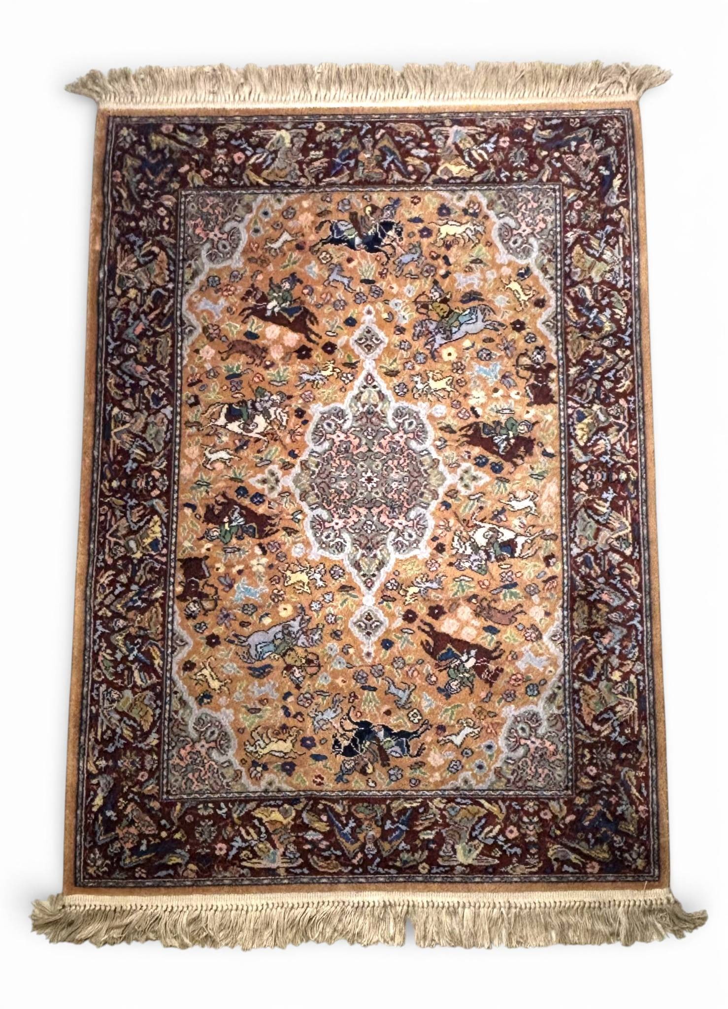 Karastan Winterthur #723 The Hunt Power Loomed Wool Area Rug: Karastan Winterthur Collection model #723, titled "The Hunt" power-loomed area rug featuring a detailed central medallion and intricate depictions of hunting scenes with riders, animals, and flora.