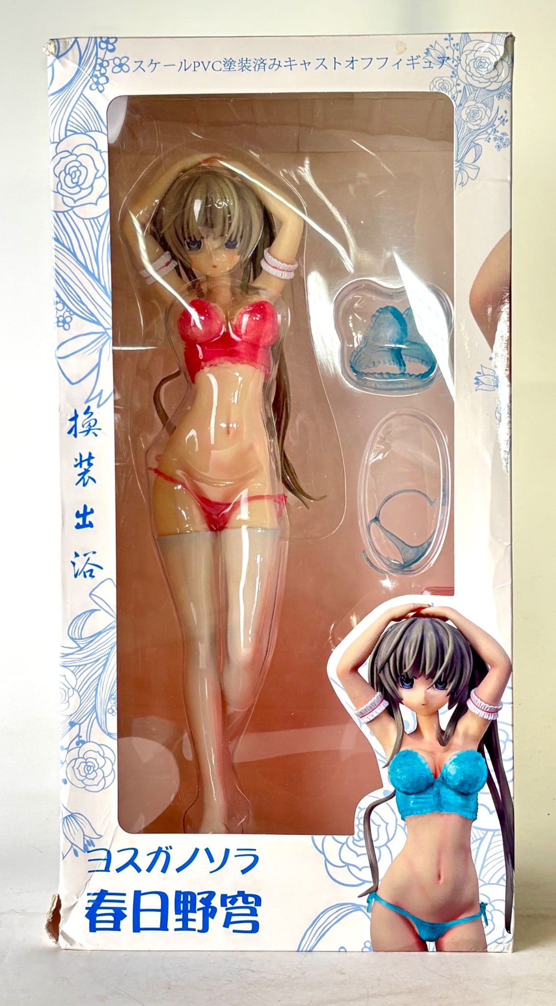 Yosuga No Sora Haruka Kasugano PVC Figure: A detailed 1/7 scale PVC figure of Haruka Kasugano from Yosuga no Sora, dressed in lingerie red variant. Includes interchangeable parts and comes in original packaging featuring floral artwork. Box sh