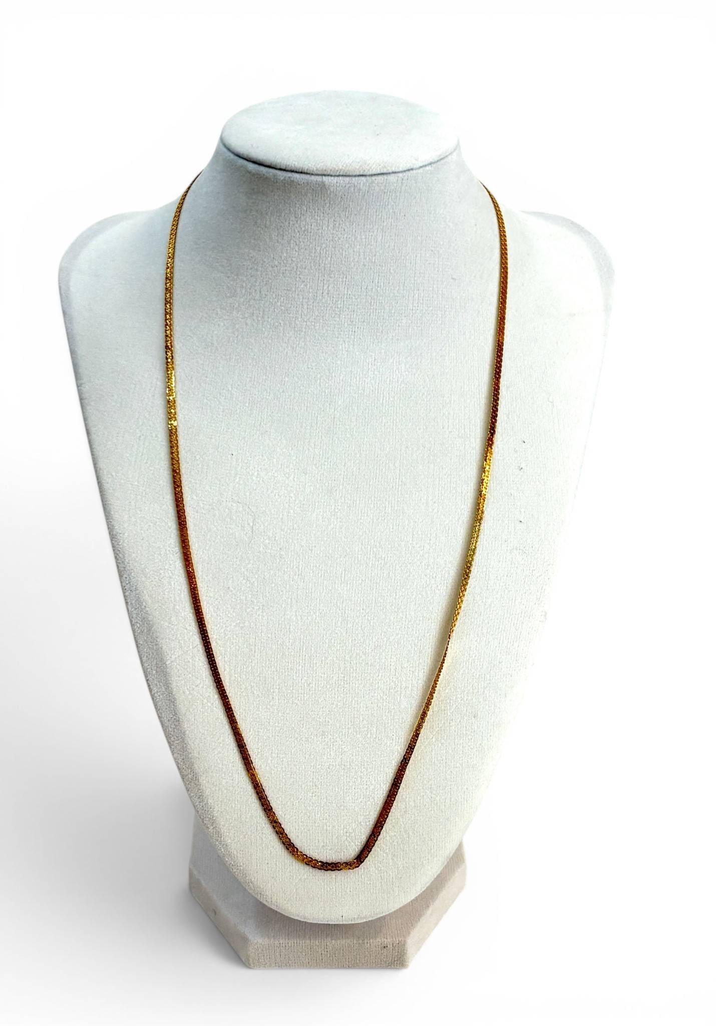 Italian 18K Gold Braided Necklace: Italian-made braided necklace crafted in 18K gold. Features a delicate braided chain design with a spring ring clasp marked Italy and 18K. Total length approximately 22 inches. Exhibits light wear con