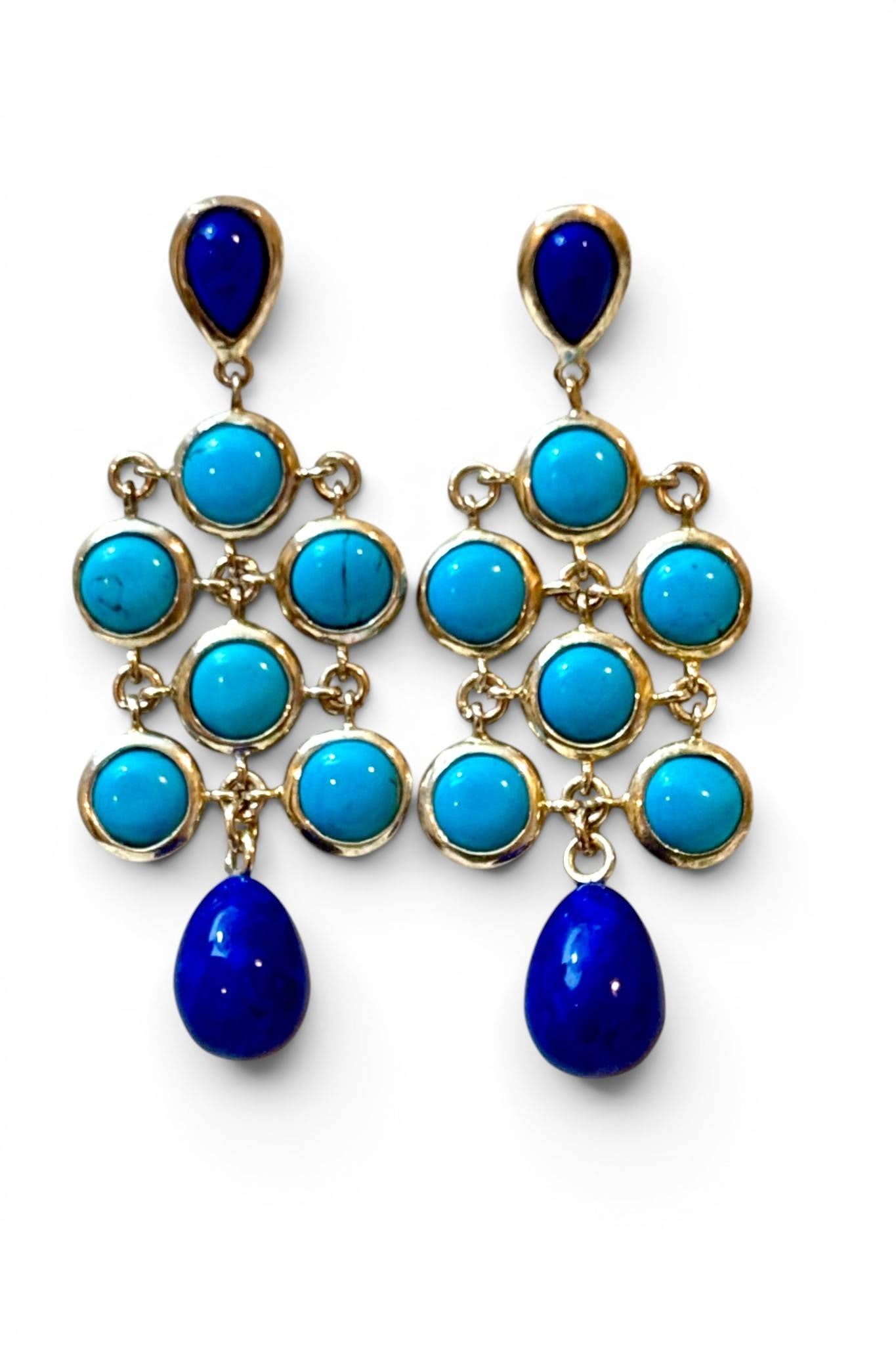 Sterling Silver Earrings with Turquoise and Lapis: Sterling silver drop earrings featuring bezel-set round turquoise stones and pear-shaped lapis lazuli gemstones. The earrings include additional lapis dangles and intricate linking, marked 925 and Chi