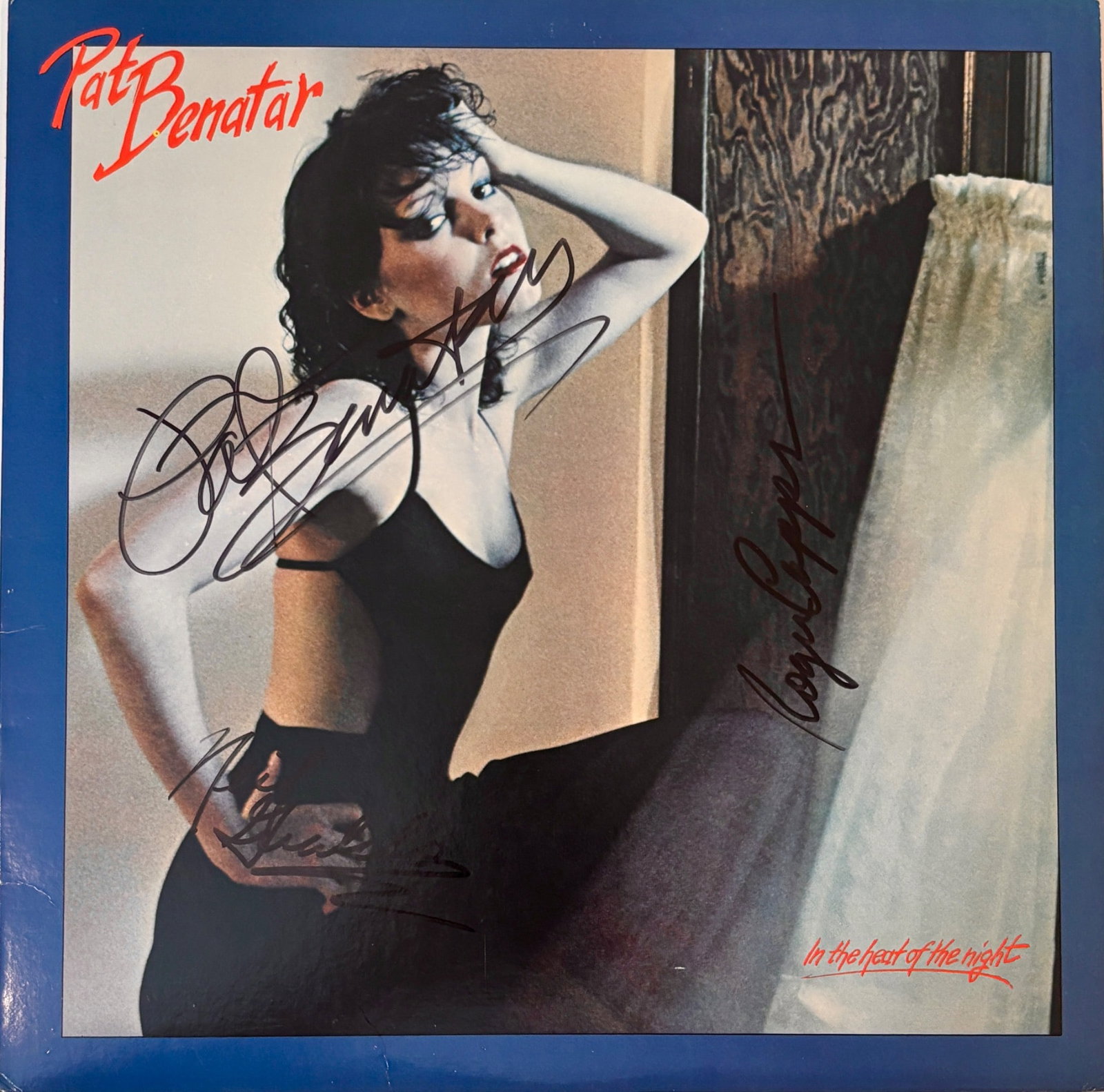 Pat Benatar In The Heat Of The Night LP Signed: Signed vinyl record album In The Heat of the Night by Pat Benatar. Autographs include Pat Benatar, Neil Giraldo, and Roger Capps on the album cover. Original Chrysalis Records pressing with blue