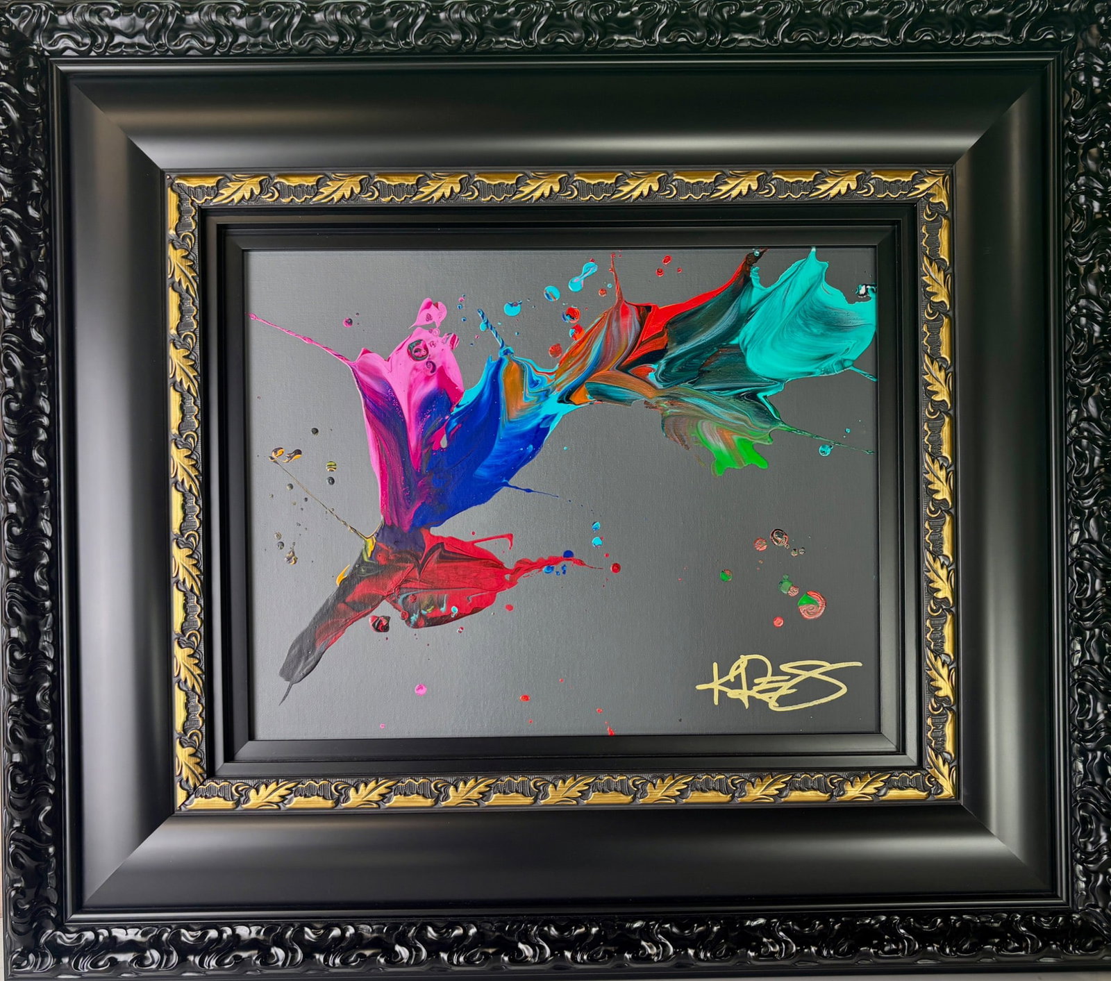 Kre8 Mini Abstract Acrylic Painting on Canvas Unique: Unique mini abstract acrylic painting on canvas by Kre8 featuring bold, colorful strokes and splatter effects. The artist's gold signature is visible on the lower right of the canvas. Displayed in an 