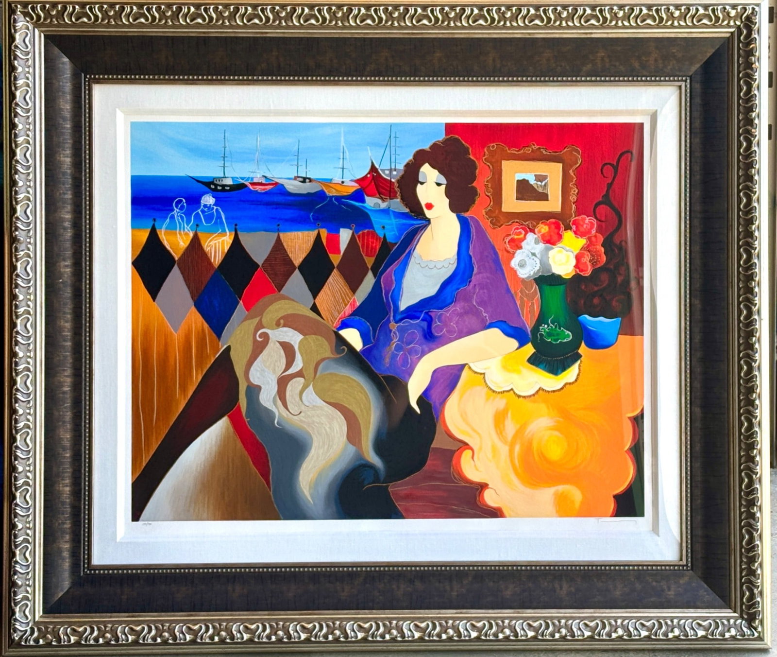 Itzchak Tarkay ‘Summer Breeze II’ Serigraph on Paper: Itzchak Tarkay ‘Summer Breeze II’ serigraph, number 177/350, featuring a seated woman with colorful motifs and a seaside backdrop. Signed in pencil by the artist. Housed in a decorative double-mat