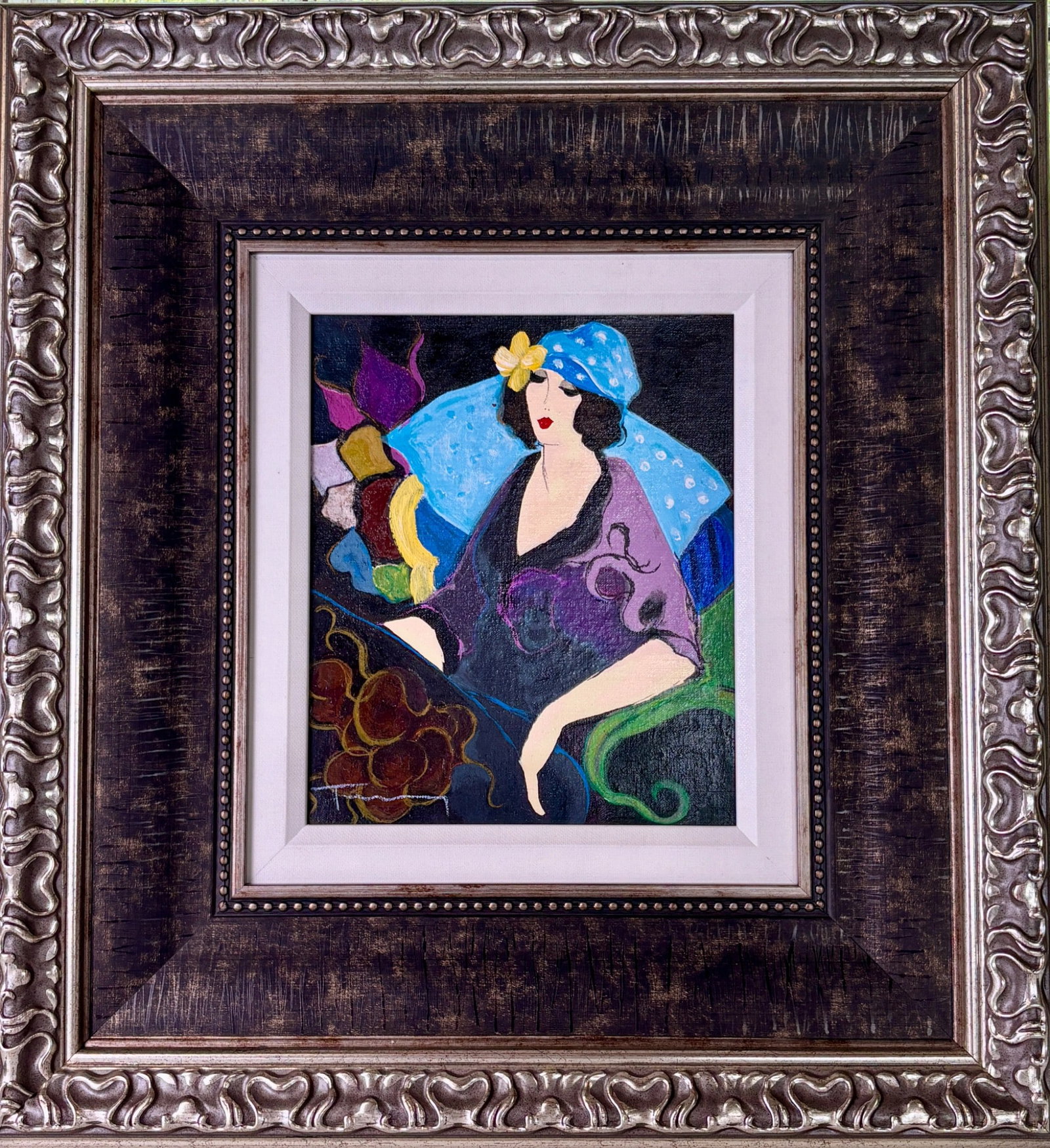 Liza by Itzchak Tarkay, Embellished Serigraph on Linen: Embellished serigraph on linen titled Liza by Itzchak Tarkay. The piece features vibrant colors and a stylized portrait of a woman, marked 89 of 90 on the canvas verso, indicating it is a limited edit