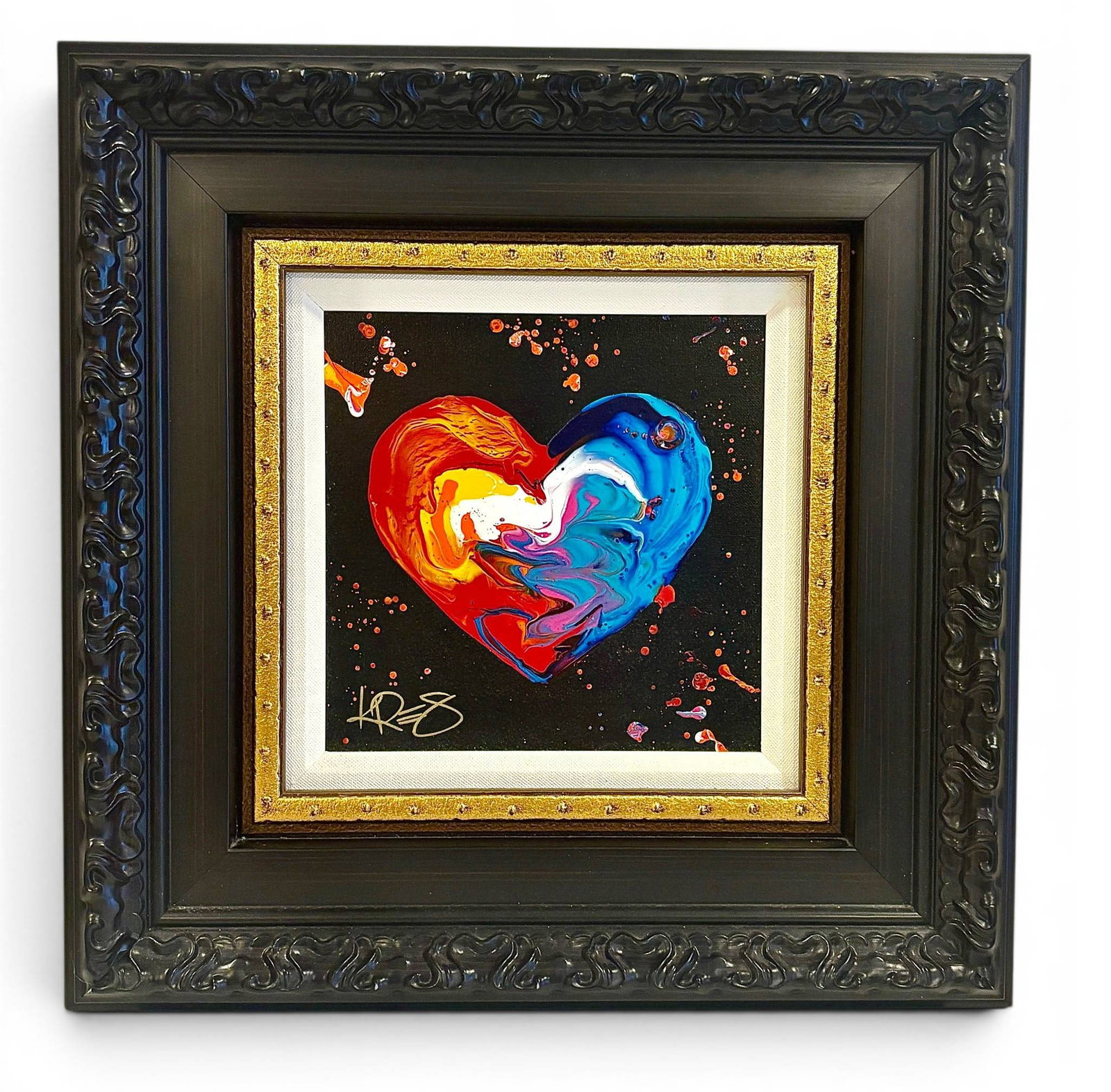 ‘I Love Hue’ KRE8 Acrylic on Canvas: Abstract acrylic painting featuring a colorful heart shape rendered in vibrant swirls of red, yellow, blue, white, and pink. Artwork is set against a black background with splattered accents and signe