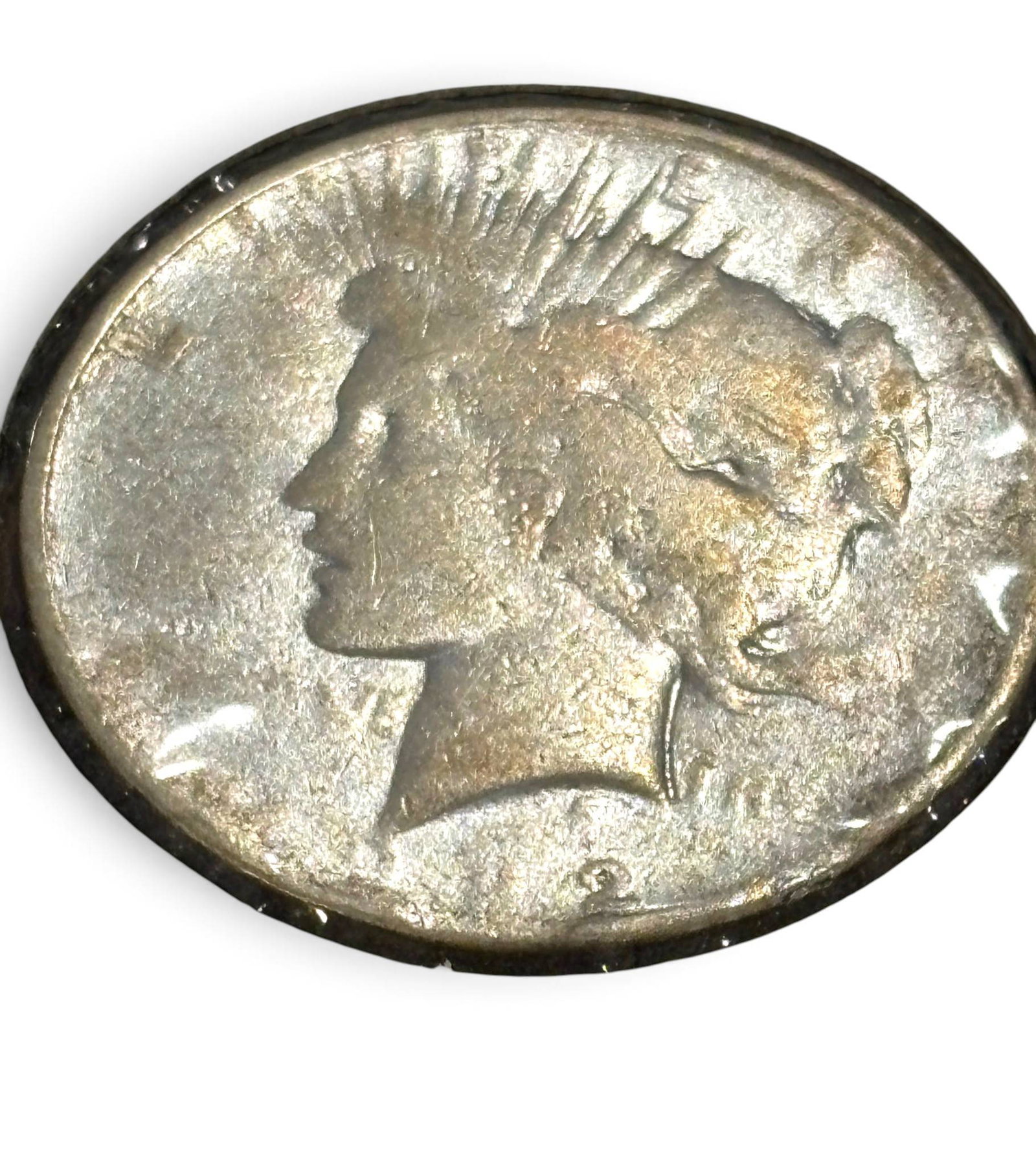 1922 U.S. Peace Silver Dollar Coin: 1922 U.S. Peace Silver Dollar featuring a left-facing Liberty profile on the obverse and a perched eagle on the reverse. Composed of 90 percent silver and 10 percent copper, with a diameter of 38.1 mm