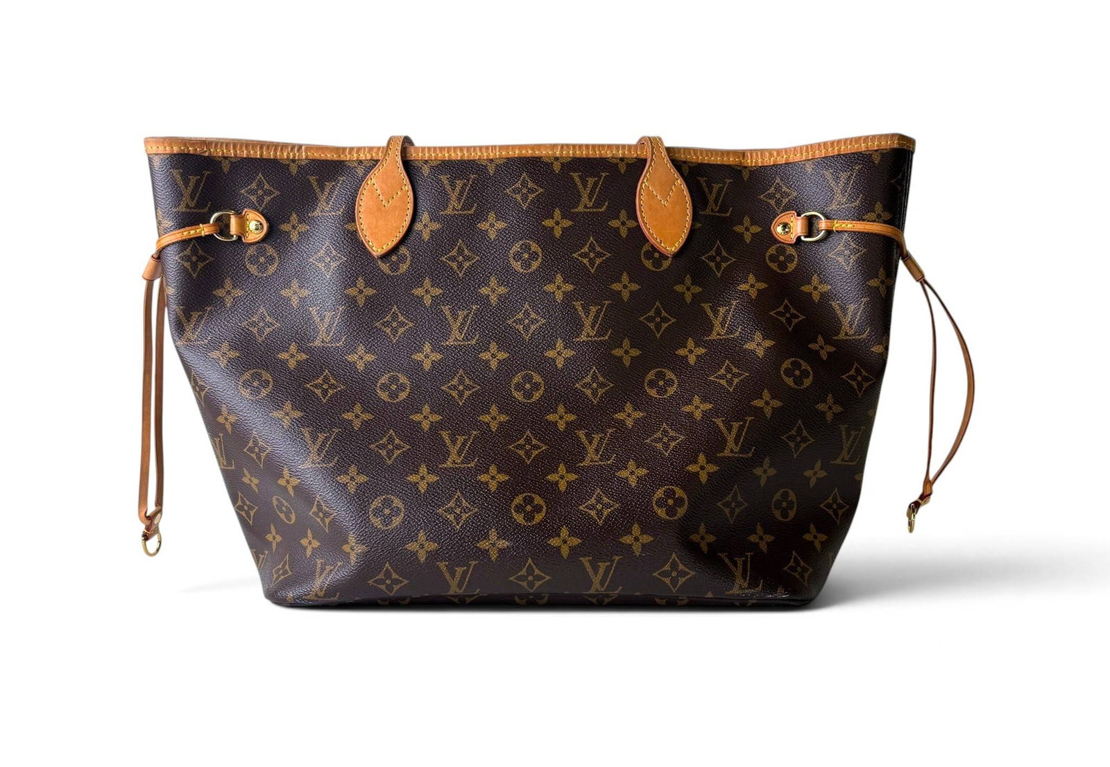 Louis Vuitton Monogram Canvas Neverfull PM Tote Bag: Louis Vuitton Neverfull PM tote bag crafted in signature monogram-coated canvas with natural vachetta leather trim and gold-tone hardware. Interior features striped textile lining, a zippered pocket,