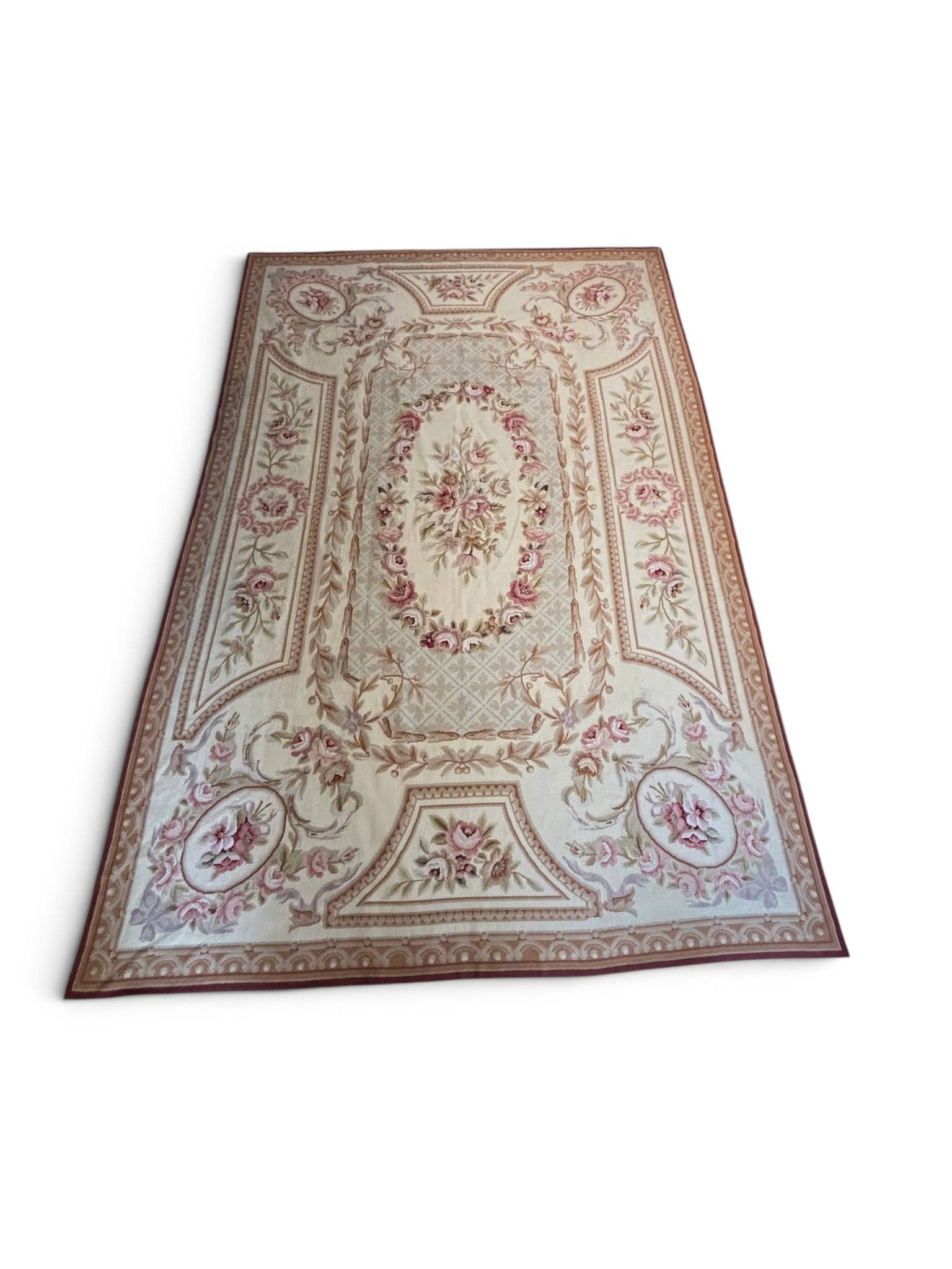 Very Fine Needlepoint Tapestry Rug 6 x 9: A needlepoint tapestry rug measuring 6 x 9 feet, featuring floral and scroll motifs in shades of pink, cream, and brown. The design includes symmetrical cartouches, bouquets, and ornate border details