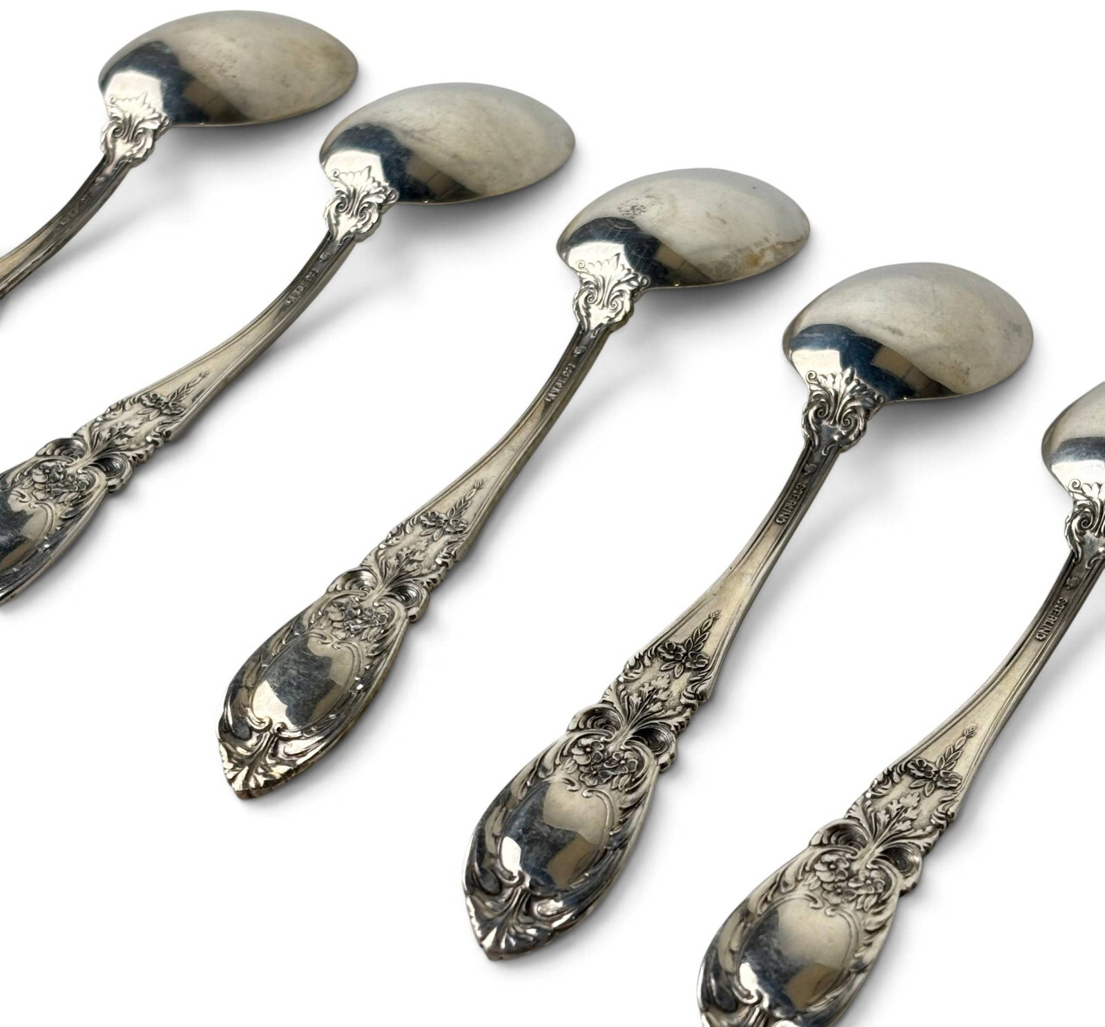 Six Sterling Silver Ornately Patterned Spoons - 7