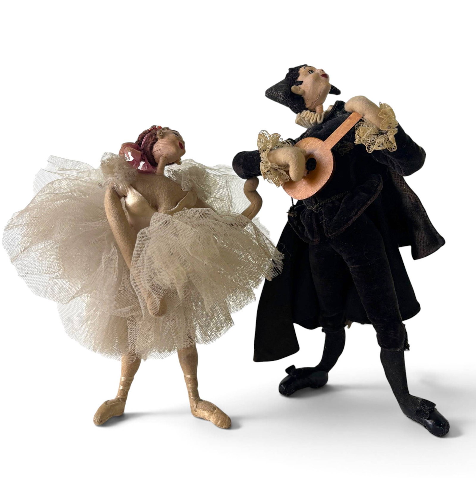 Roldan Barcelona Dolls: Guitarist and Ballerina: Handcrafted Roldan dolls from Barcelona, Spain. Includes a male guitarist in black velvet attire with lace cuffs and ribbons, holding a wooden guitar, and a ballerina adorned in a layered tulle dress